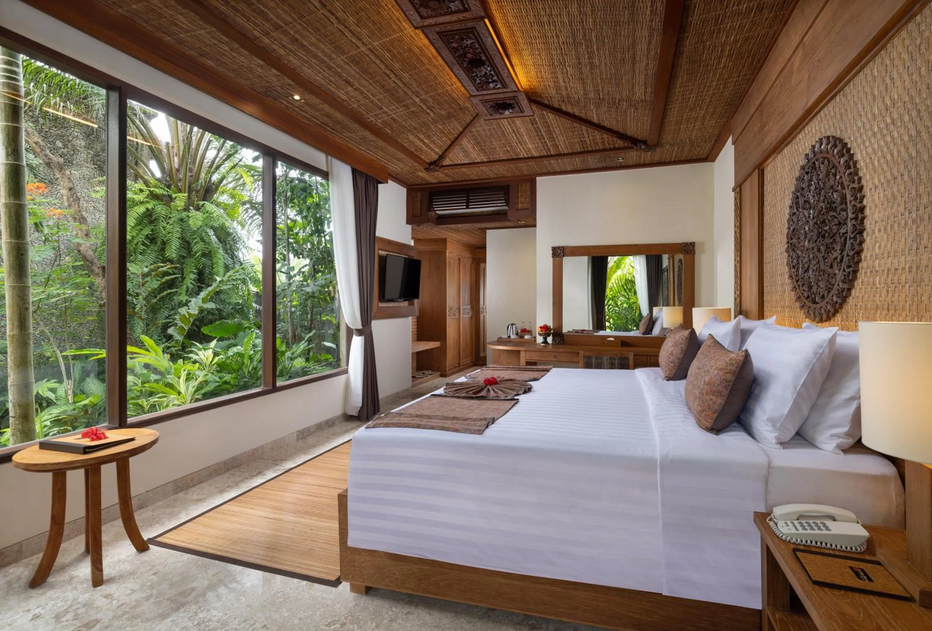 Bed in Sakti Garden Resort & Spa
