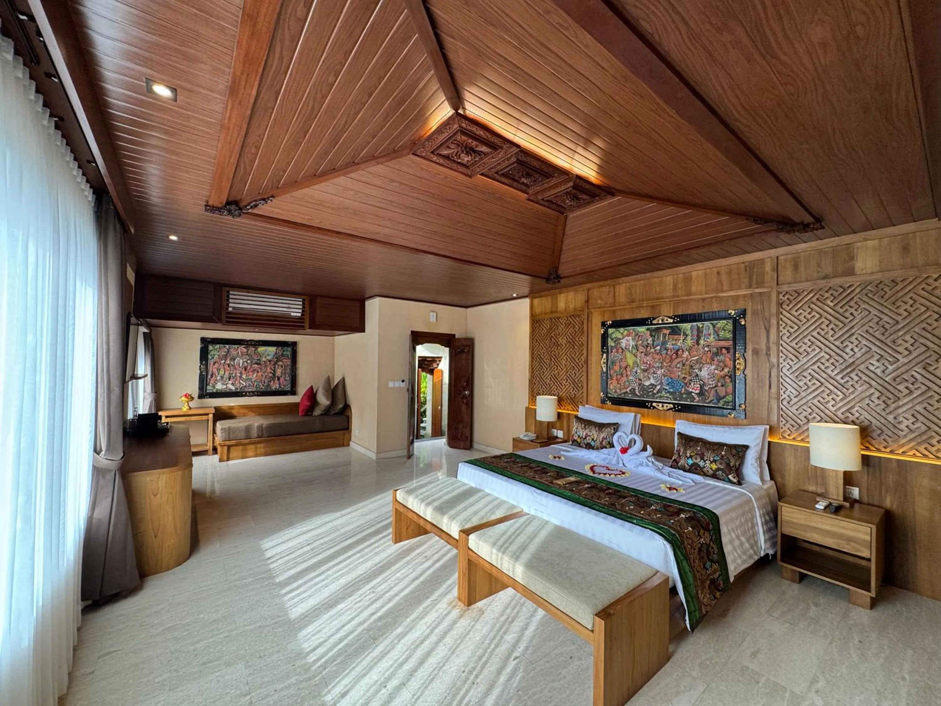 Bed in Sakti Garden Resort & Spa
