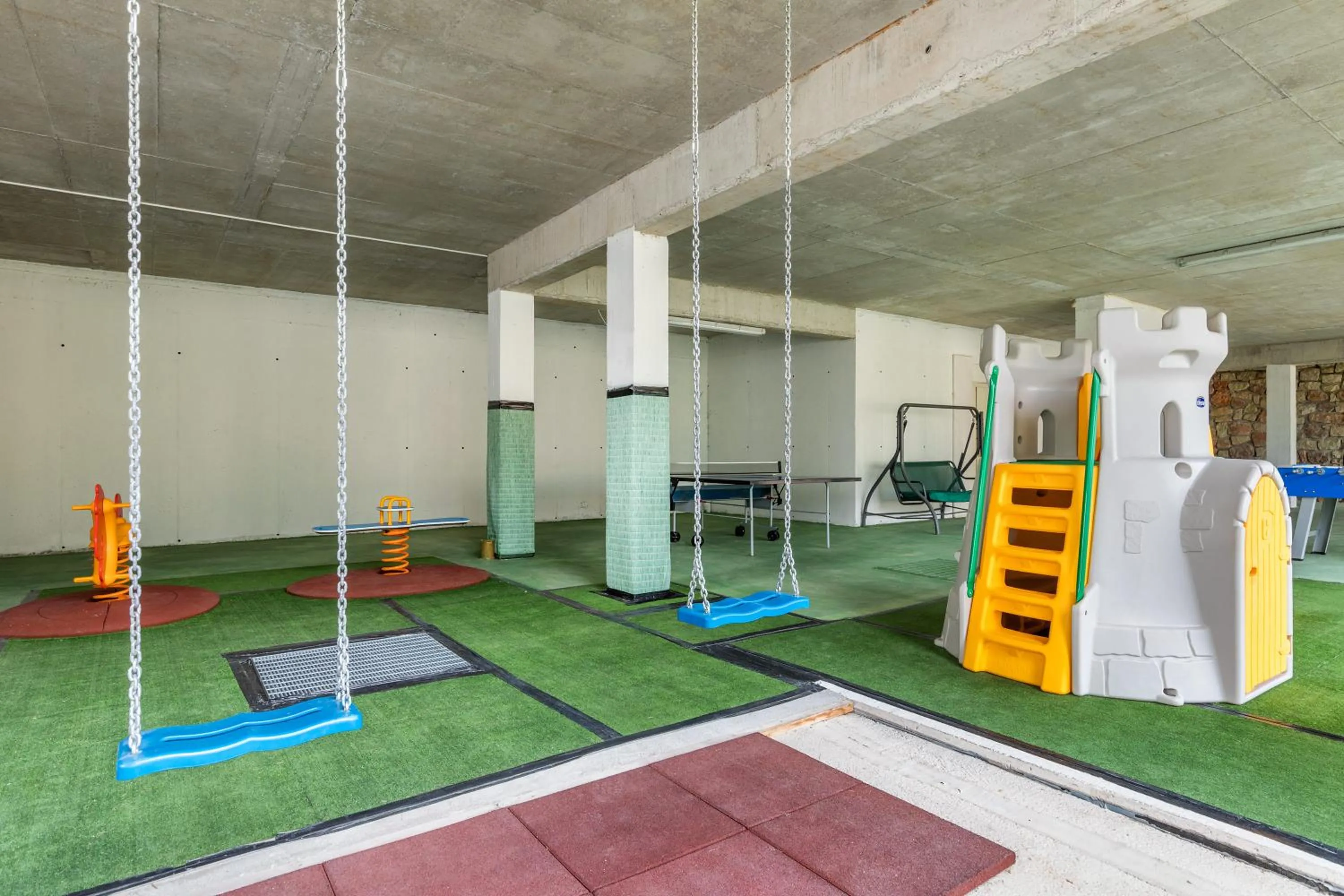 Children play ground in Appartamenti Residenza Pineta