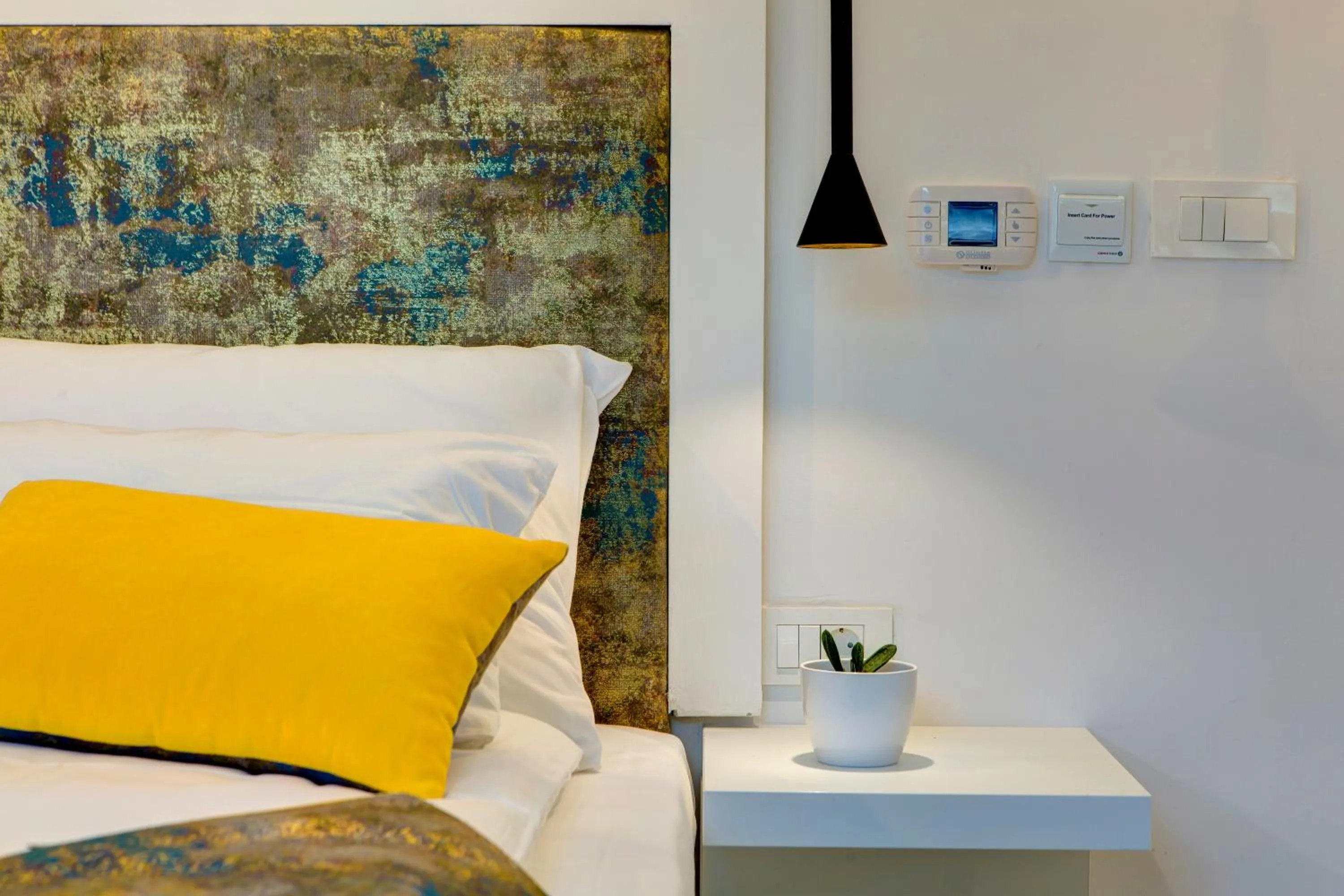 Bed in Diamond Rain Boutique Hotel