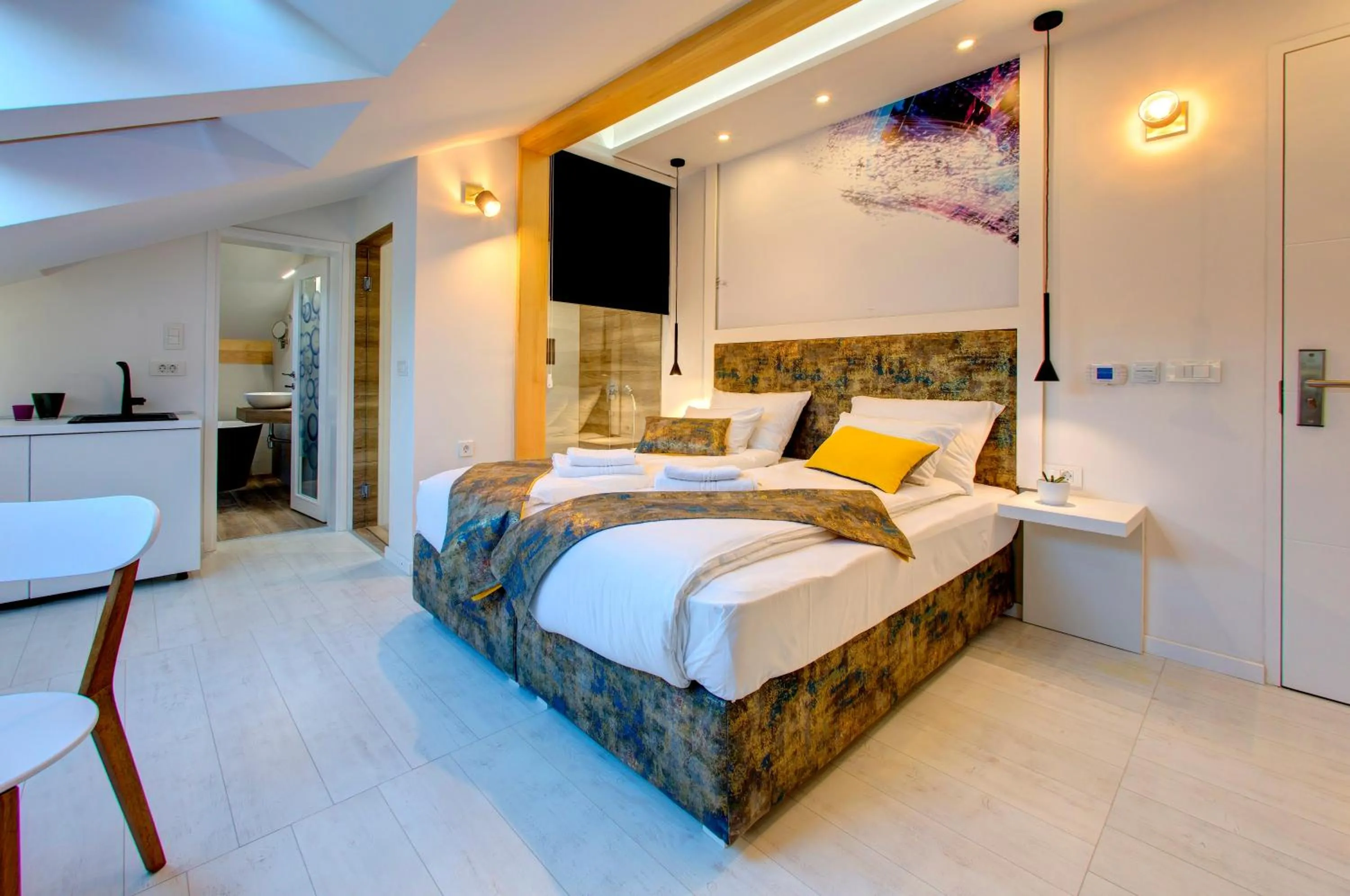 Bed in Diamond Rain Boutique Hotel