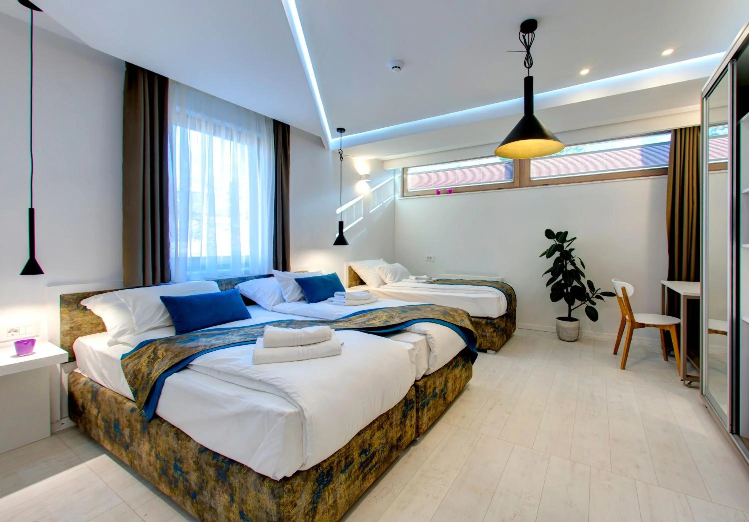 Bed in Diamond Rain Boutique Hotel