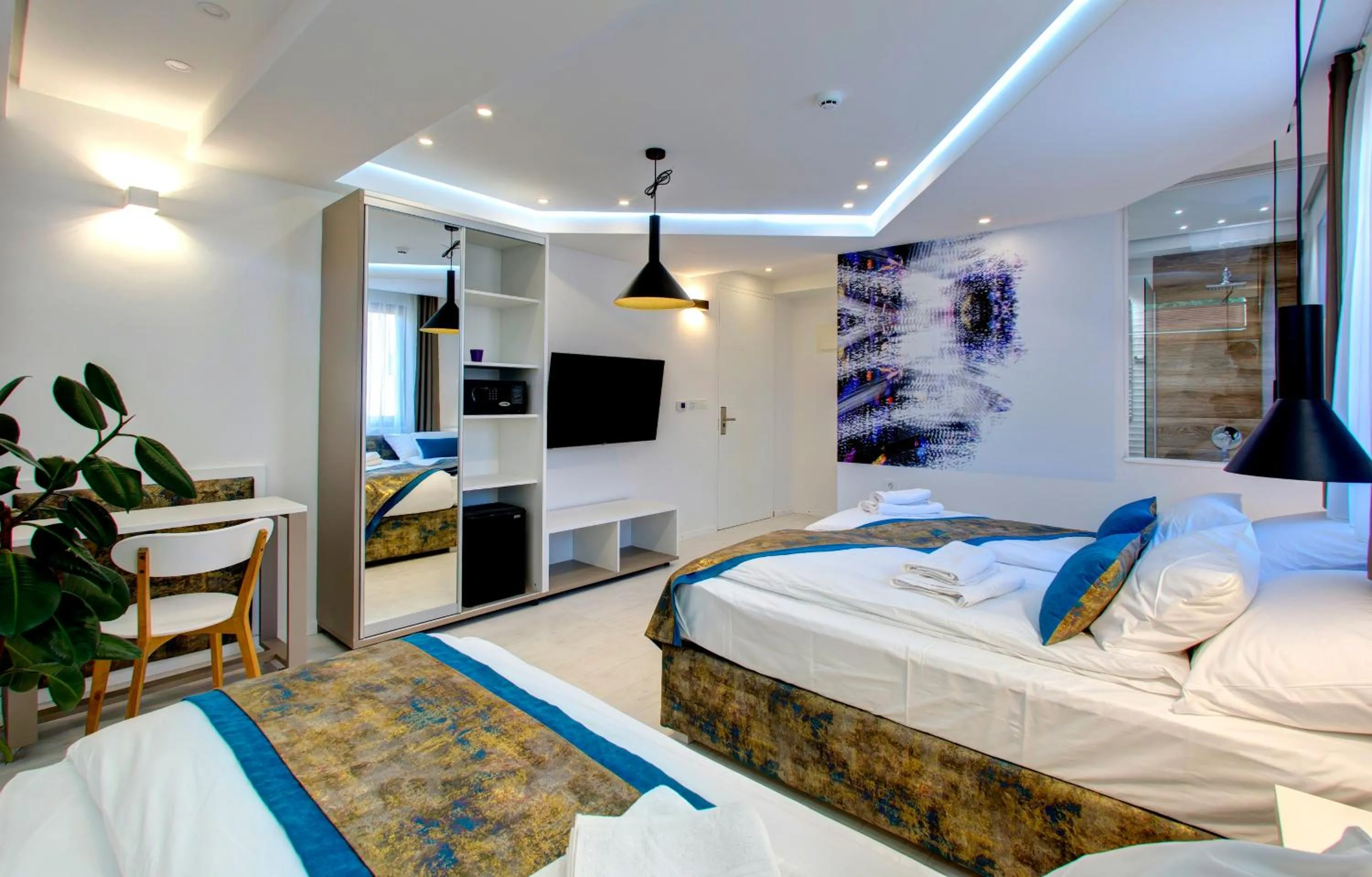 Bed in Diamond Rain Boutique Hotel