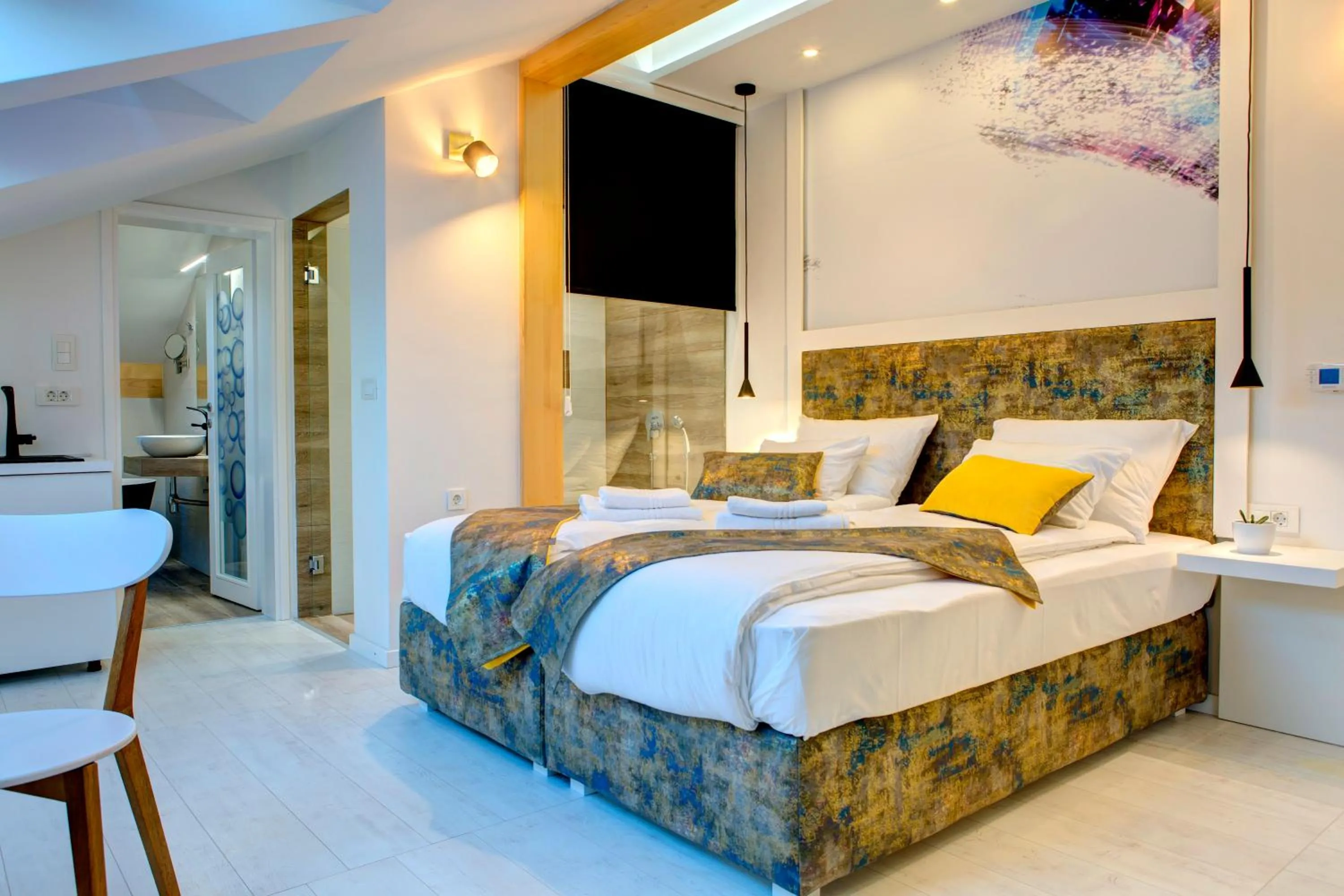 Bed in Diamond Rain Boutique Hotel