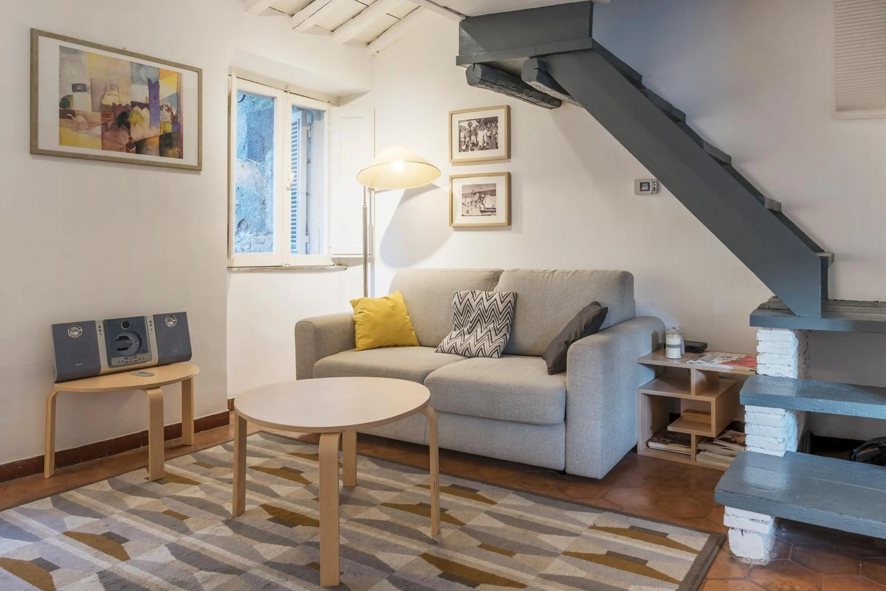 Living room in GuestHost - Charming Loft Navona
