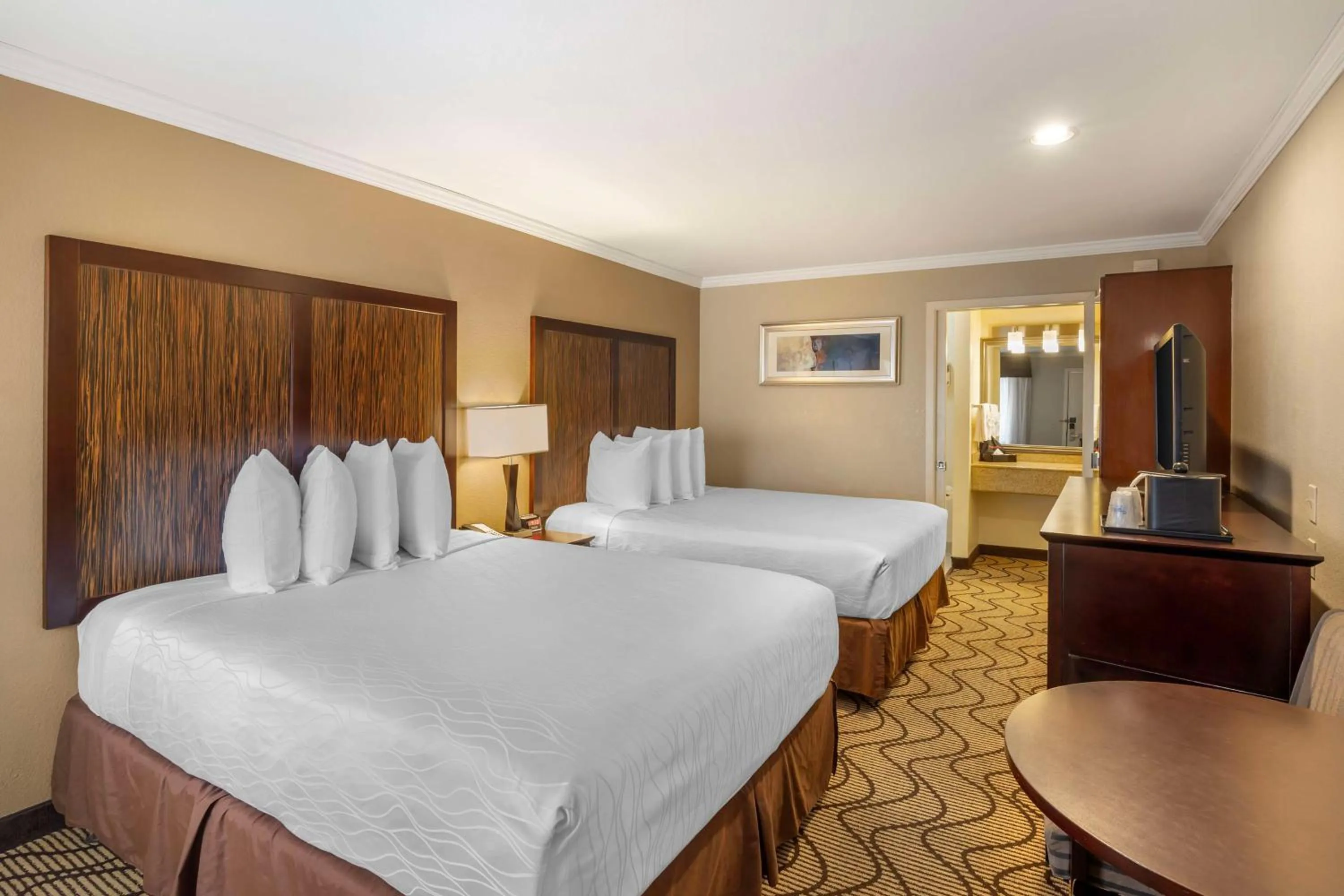 Bedroom, Bed in Best Western Plus Orchid Hotel & Suites