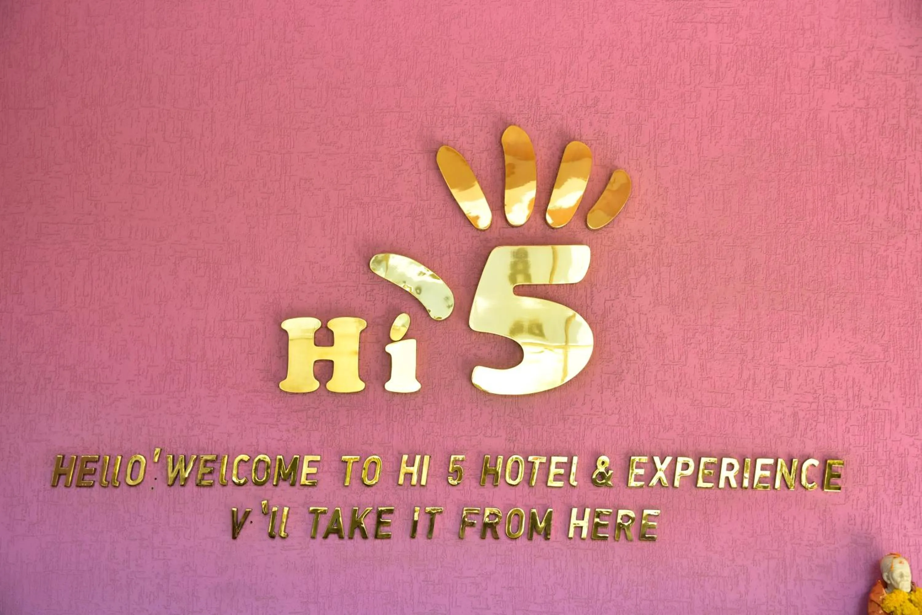 Property logo or sign in Hi 5 Hotel & Experience