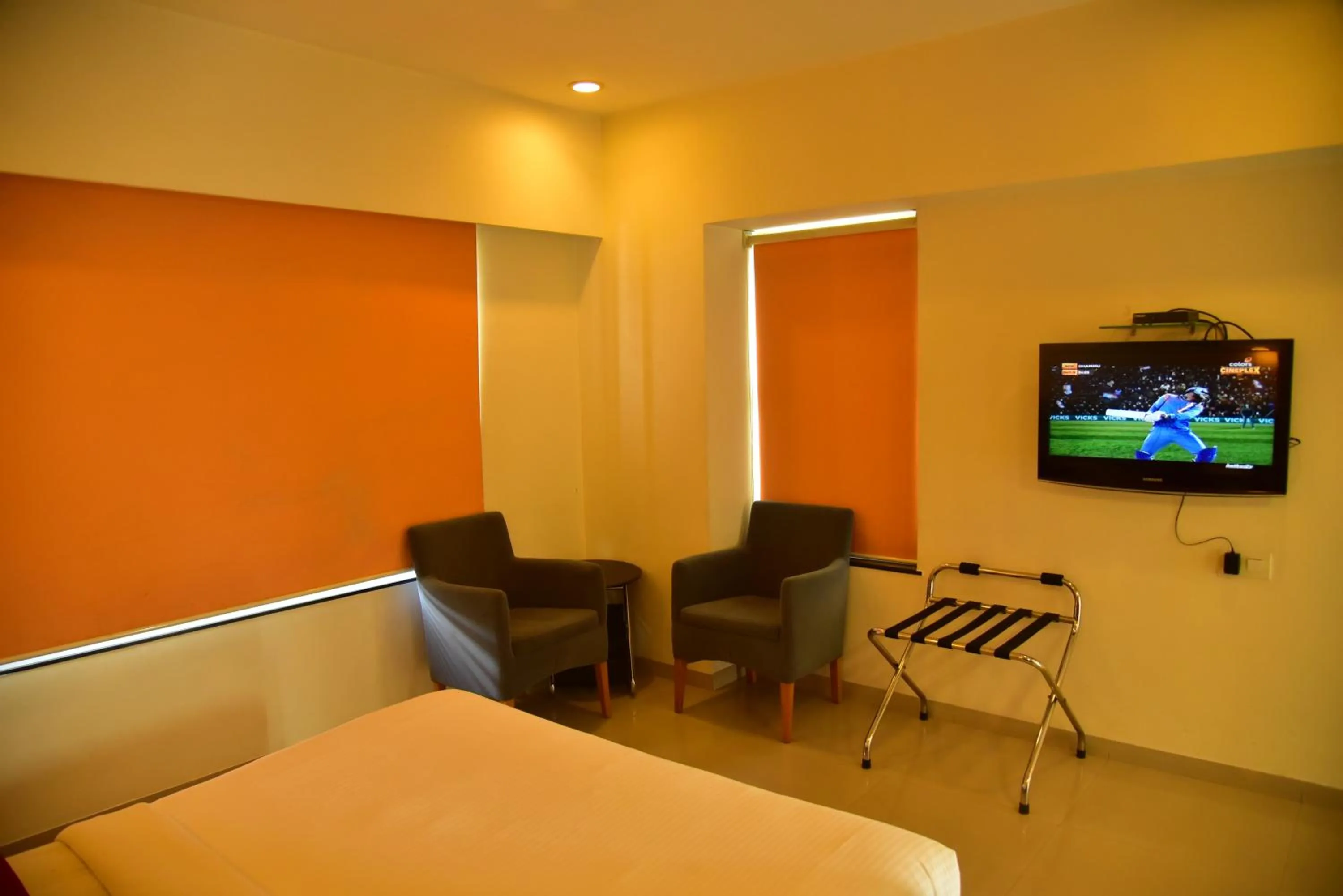 Seating area, Bed in Hi 5 Hotel & Experience