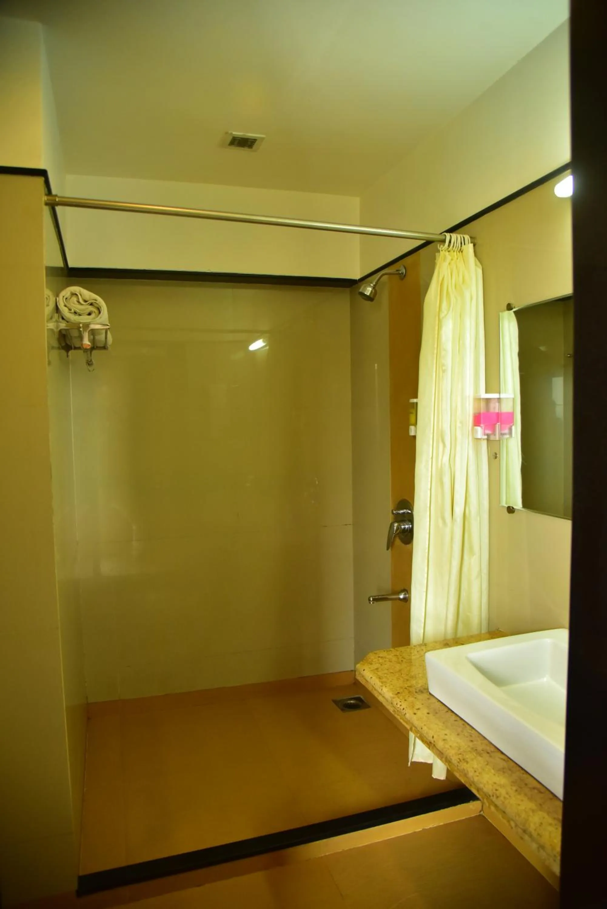 Bathroom, Bed in Hi 5 Hotel & Experience