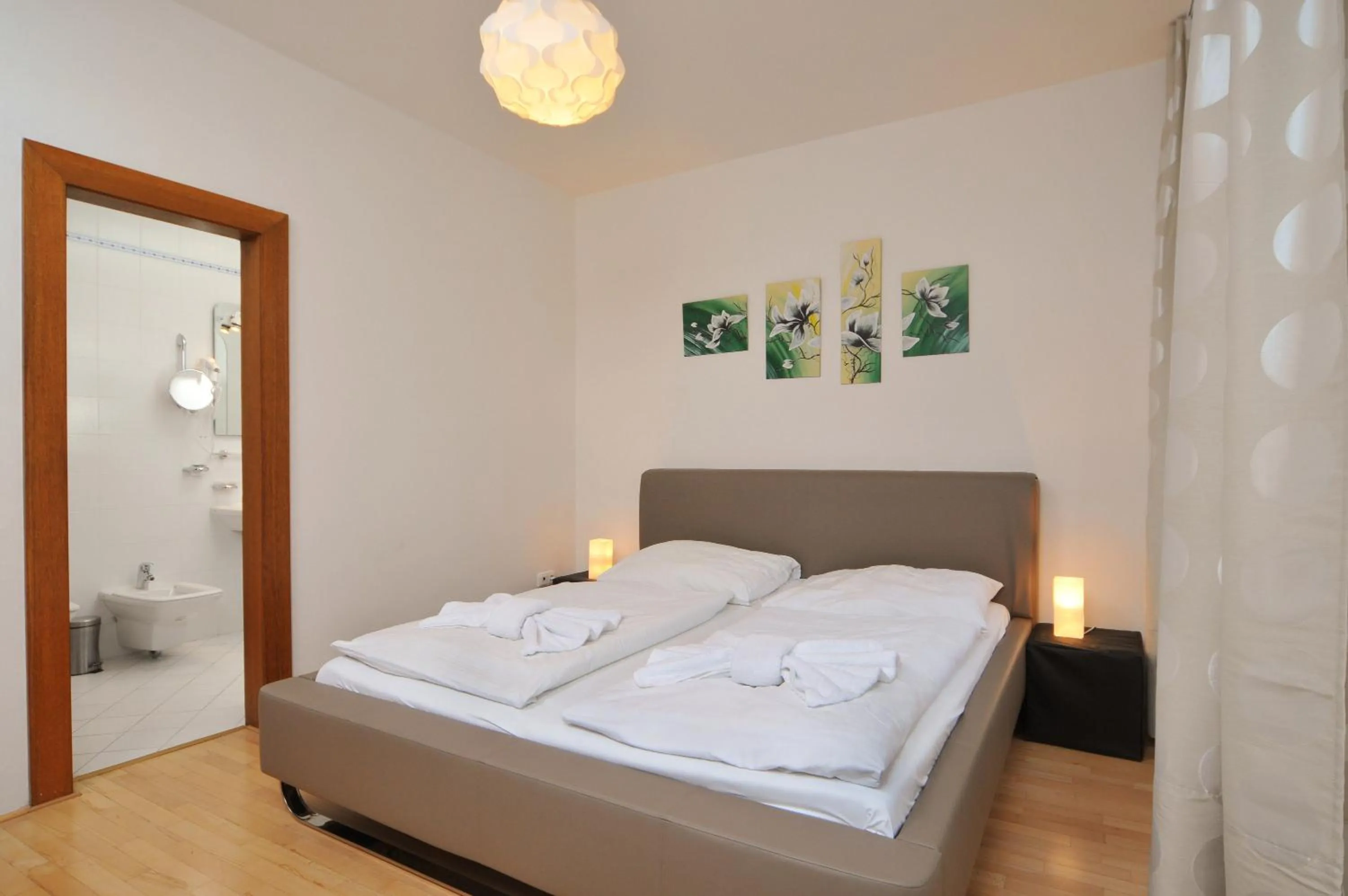 Bed in Selinor Old Town Apartments