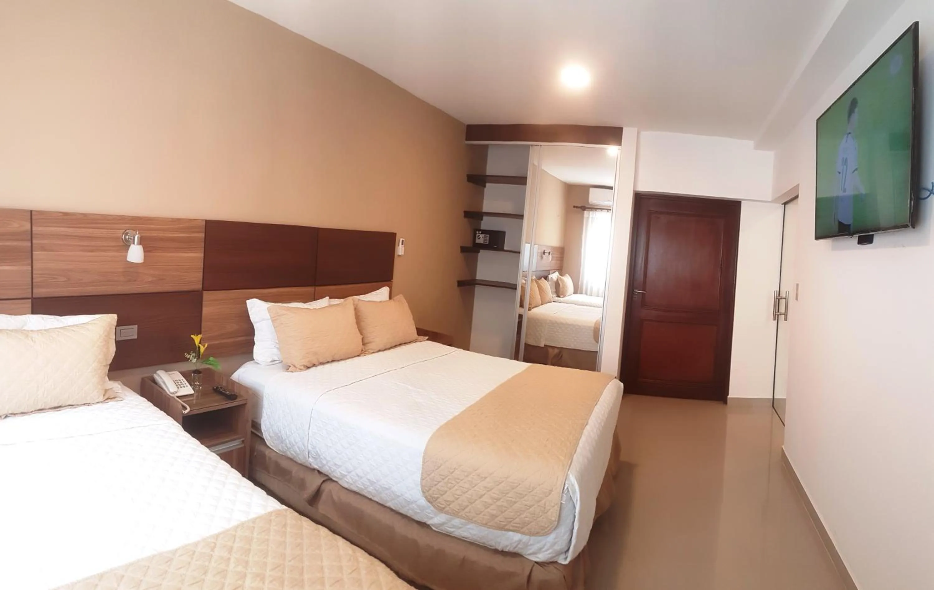 Bed in Premium Suites Deluxe Aparthotel Equipetrol