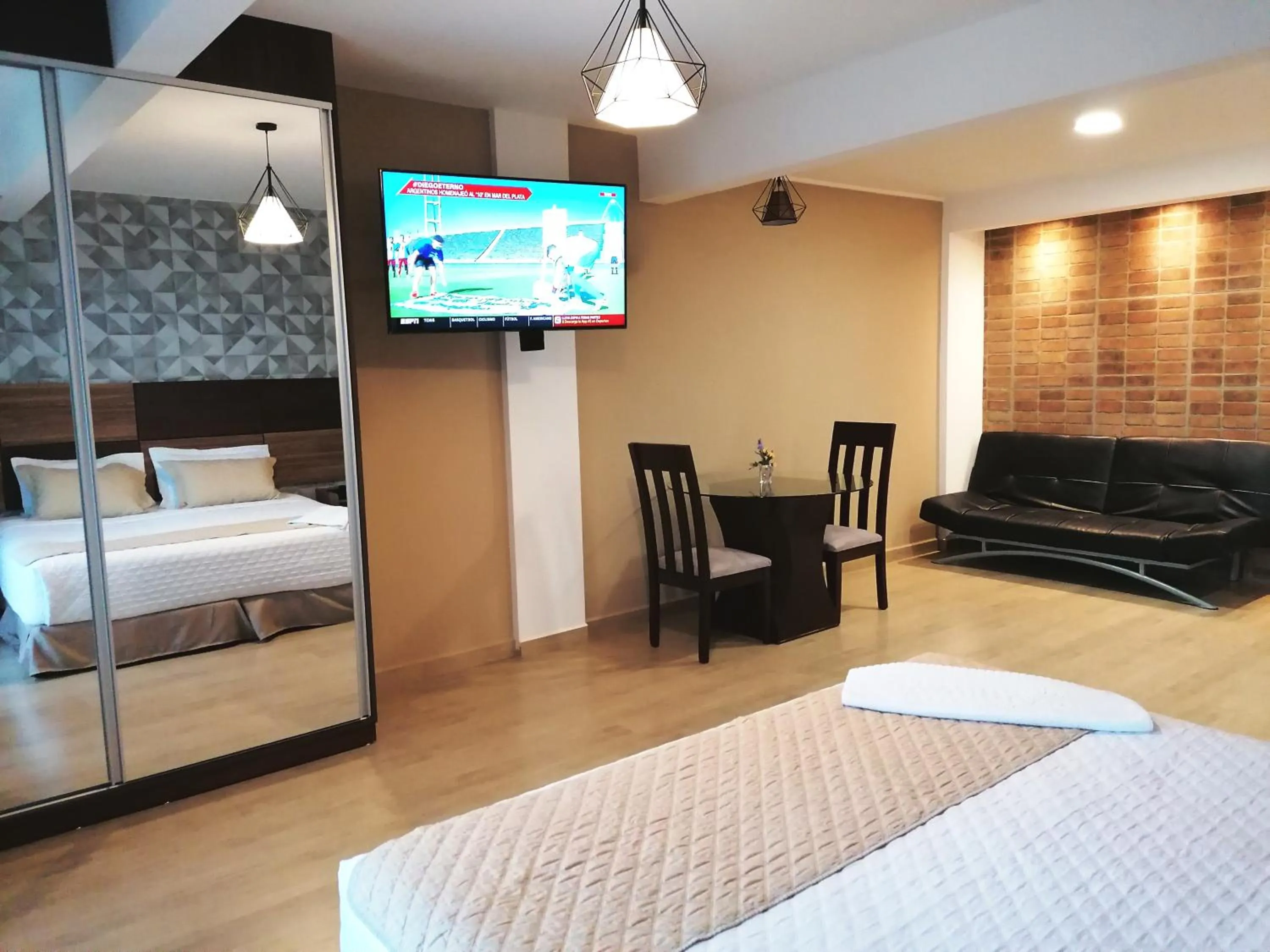 Bed in Premium Suites Deluxe Aparthotel Equipetrol