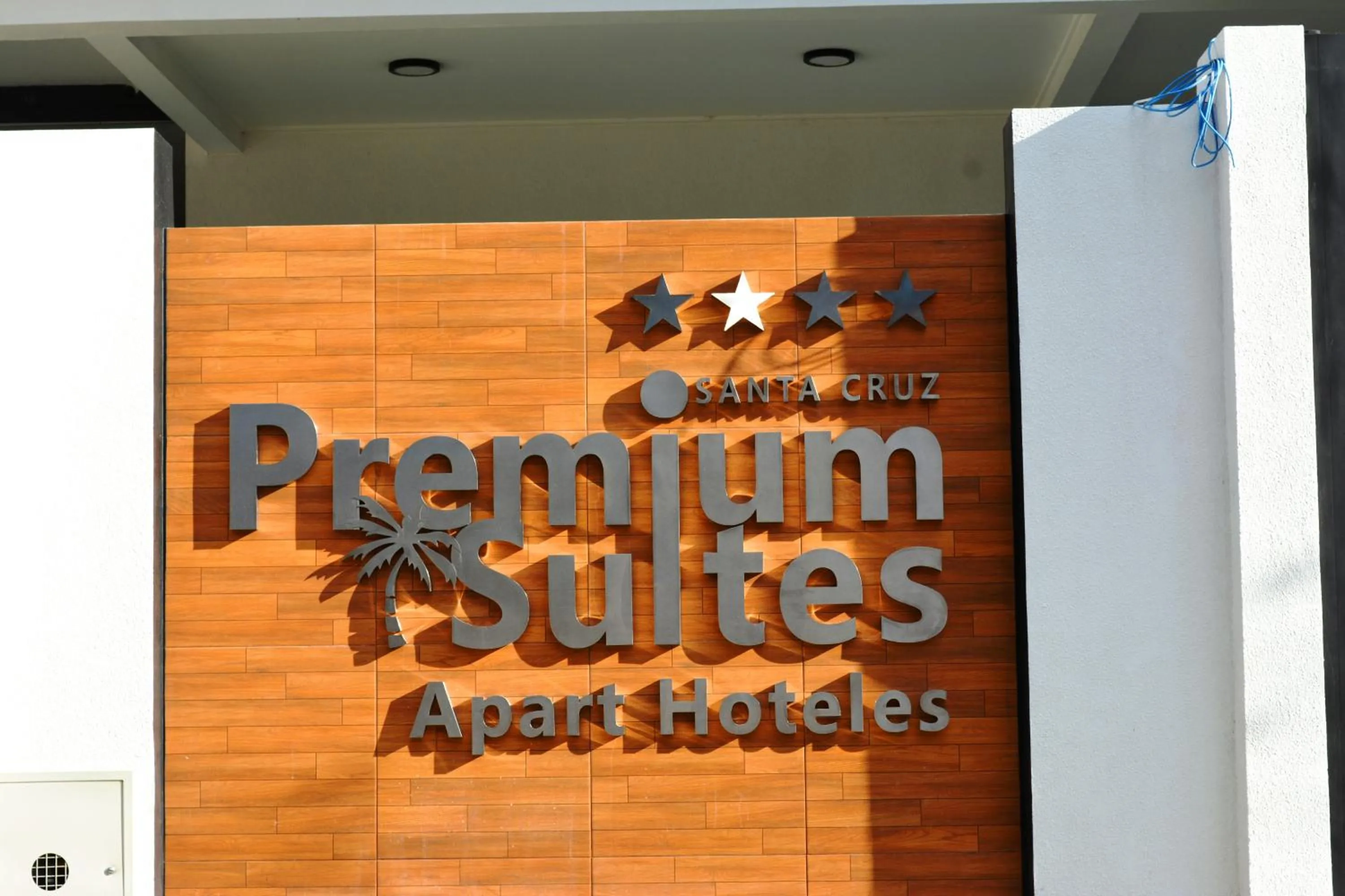 Property logo or sign in Premium Suites Deluxe Aparthotel Equipetrol