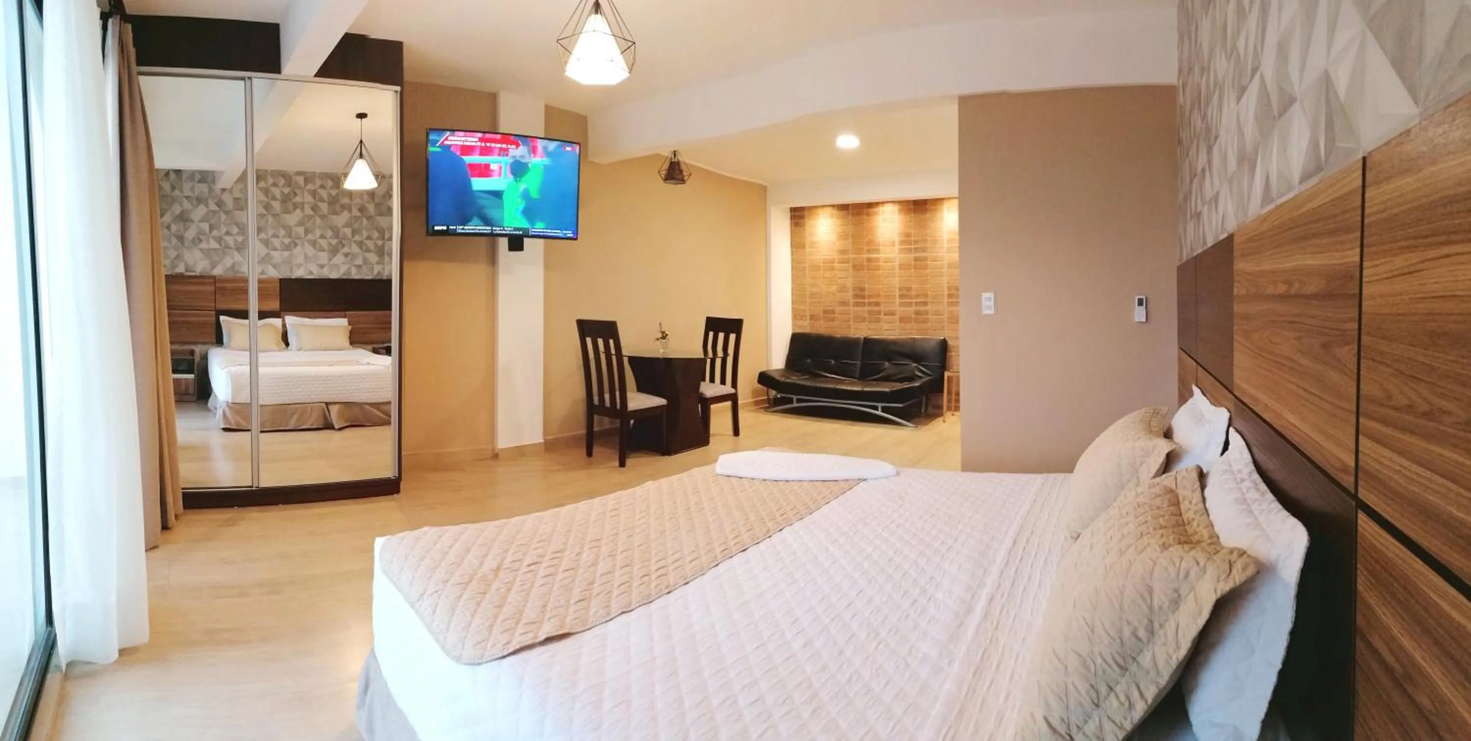 Bed in Premium Suites Deluxe Aparthotel Equipetrol