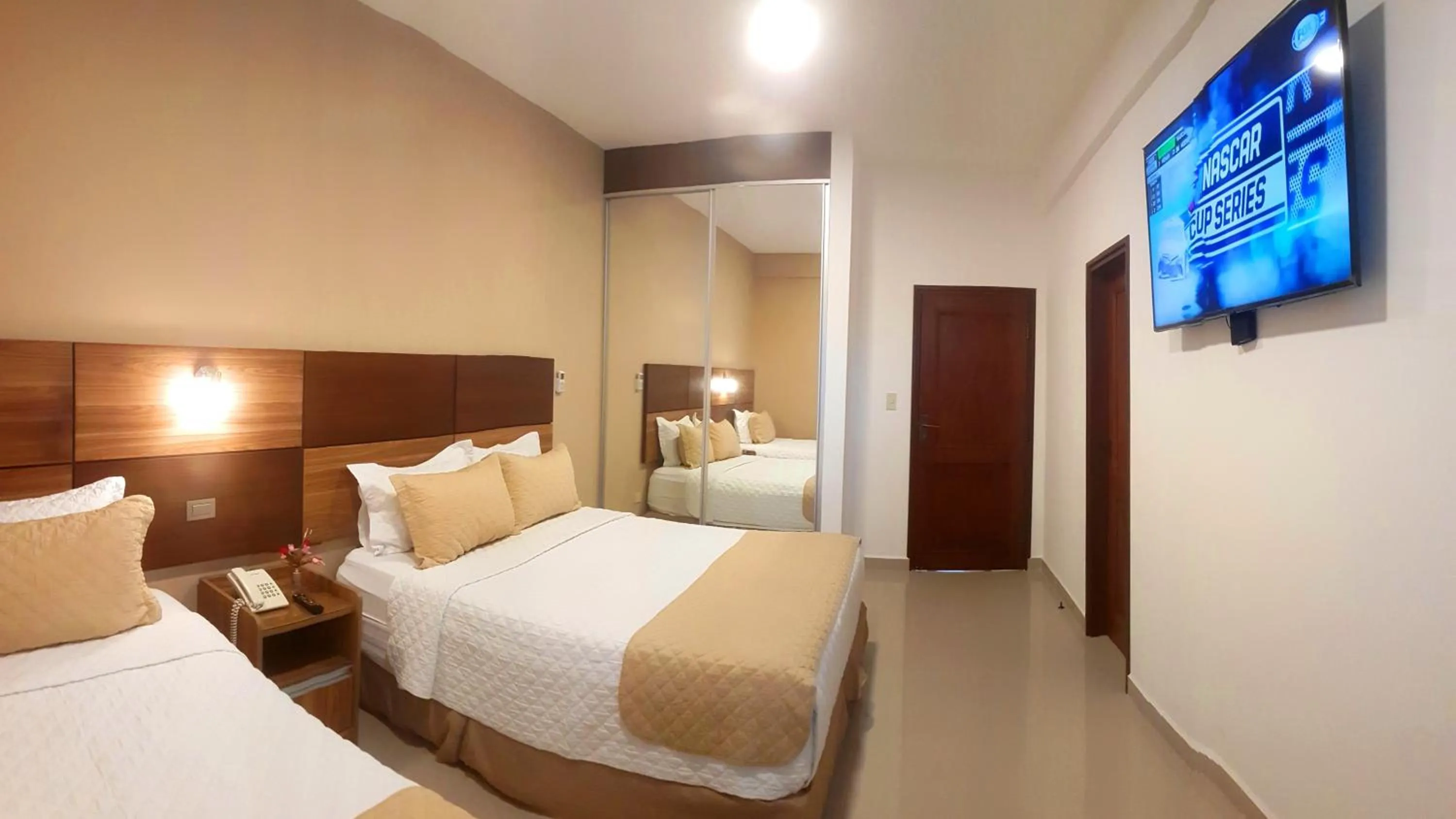 Bed in Premium Suites Deluxe Aparthotel Equipetrol