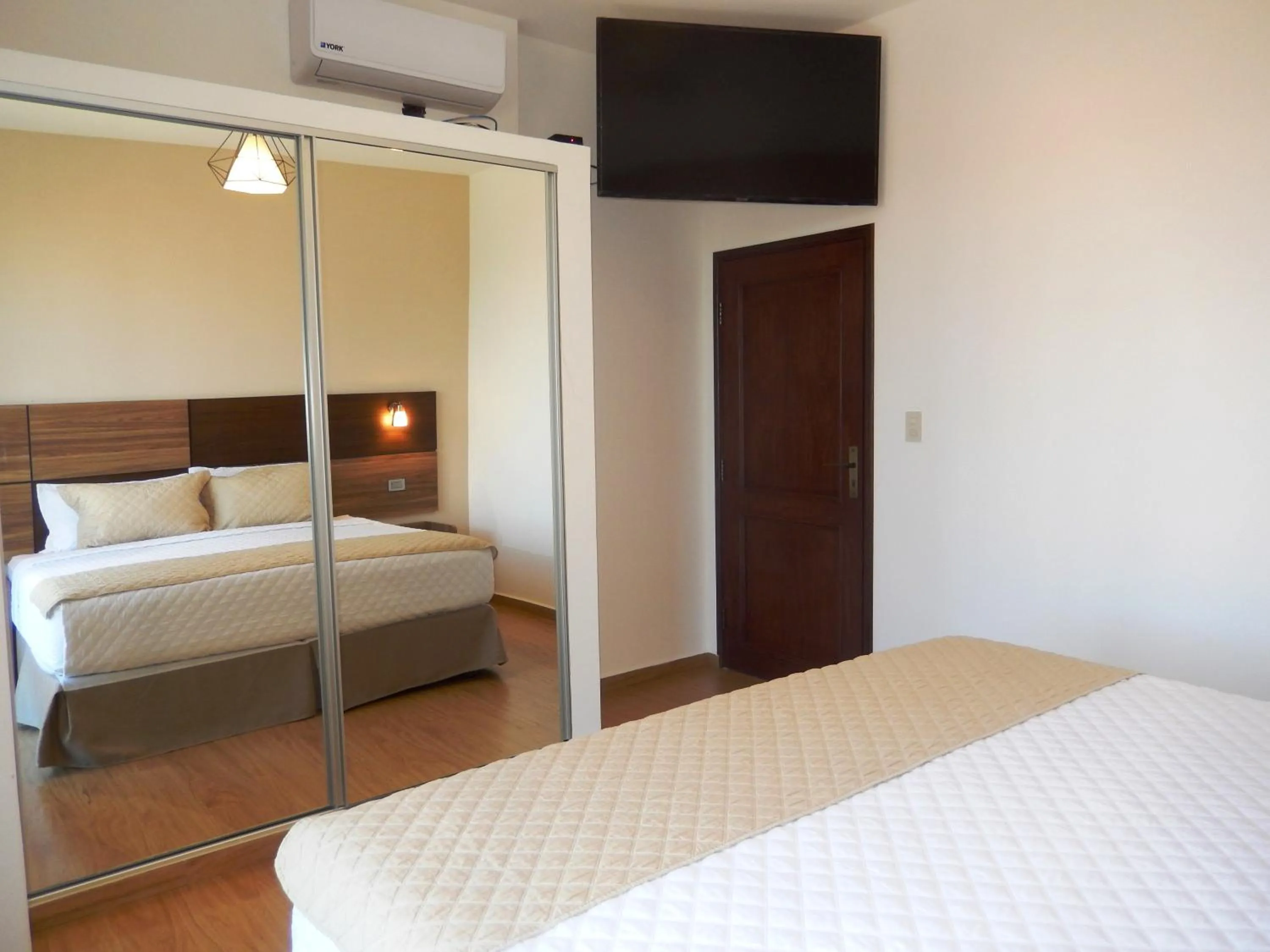 Bed in Premium Suites Deluxe Aparthotel Equipetrol