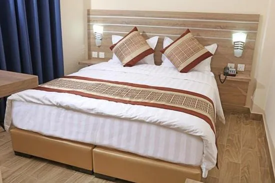 Bed in La Riva Hotel