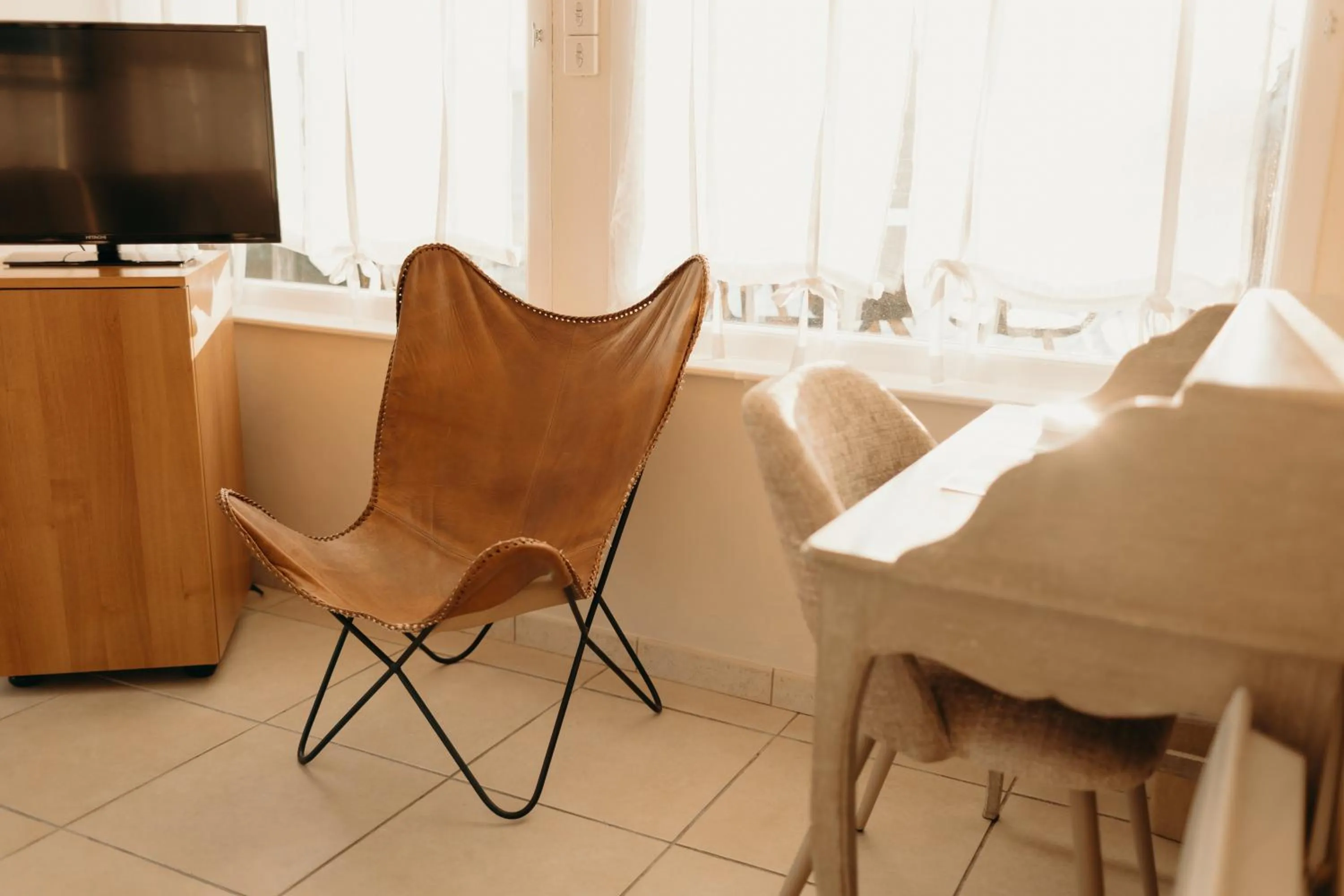 Living room in Hôtel Le Chatellier - Piscine chauffée d'avril à octobre