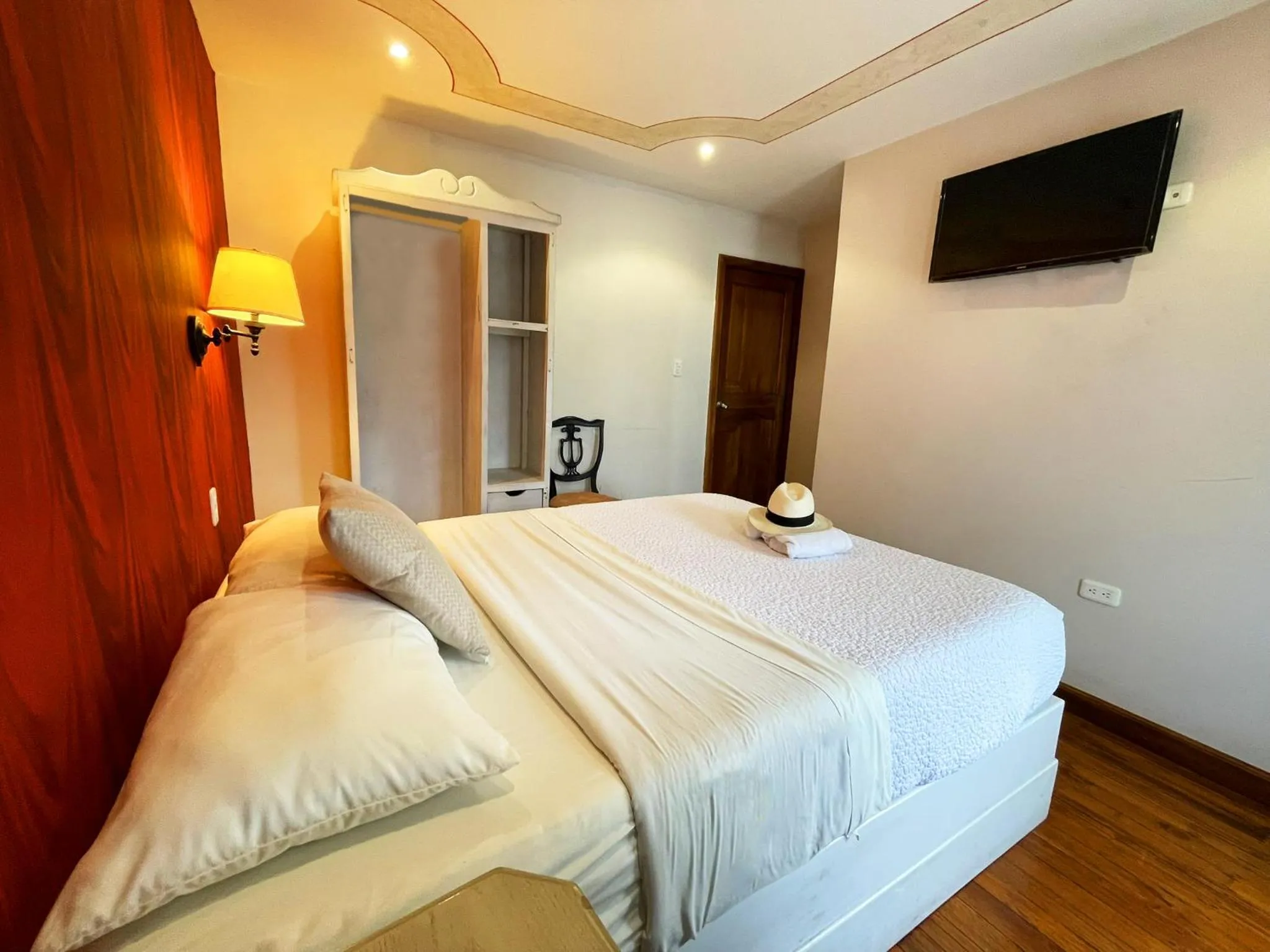 Bed in Hotel Azul de la Plaza by Chat Noir