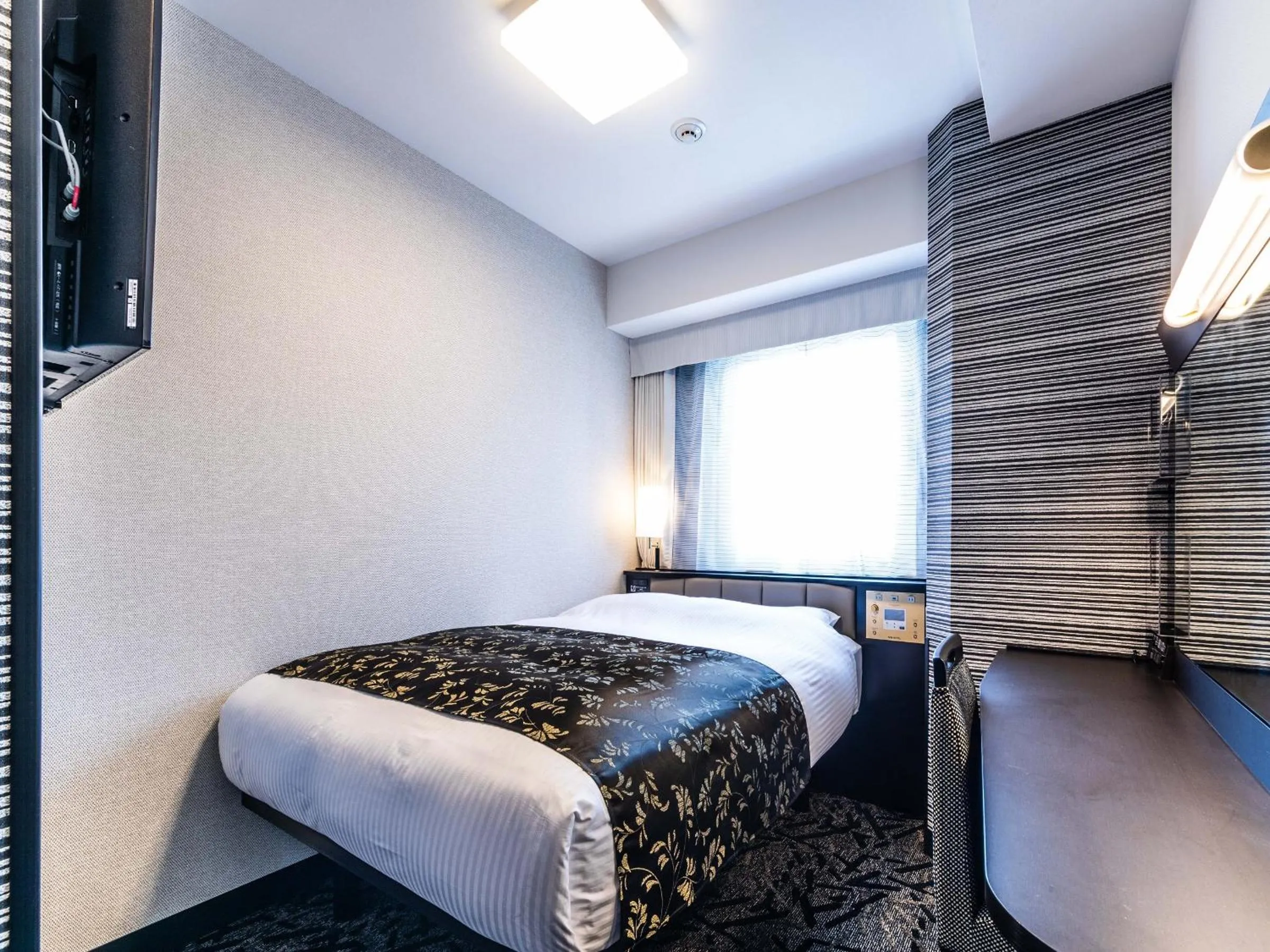 Bed in APA Hotel Nambaminami Ebisucho Eki Shinsekai