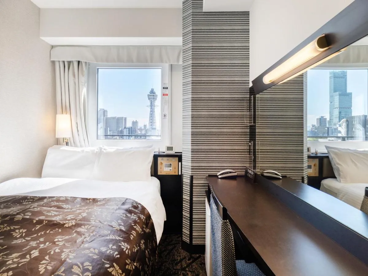 Bed in APA Hotel Nambaminami Ebisucho Eki Shinsekai