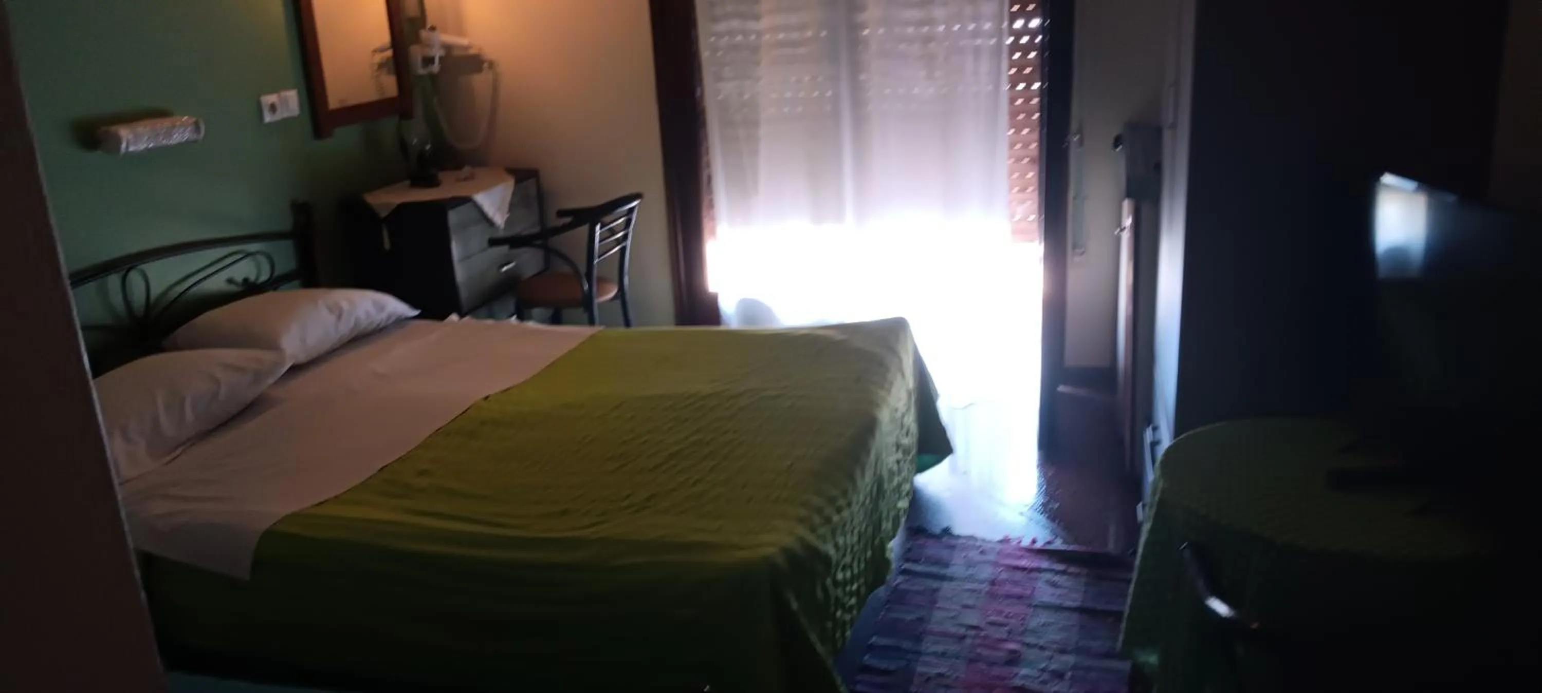 Bed in Hotel zakros rooms-restaurant