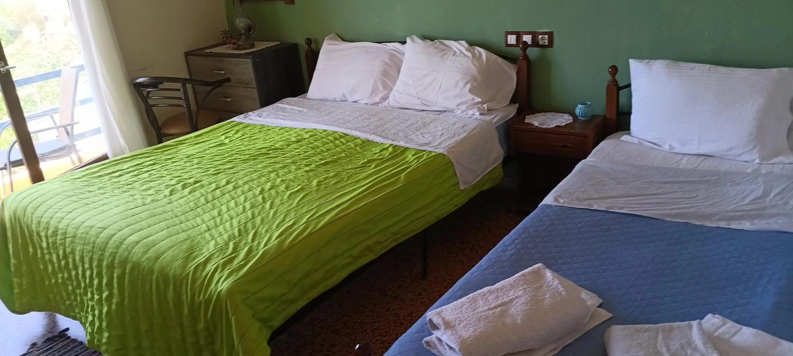 Bed in Hotel zakros rooms-restaurant