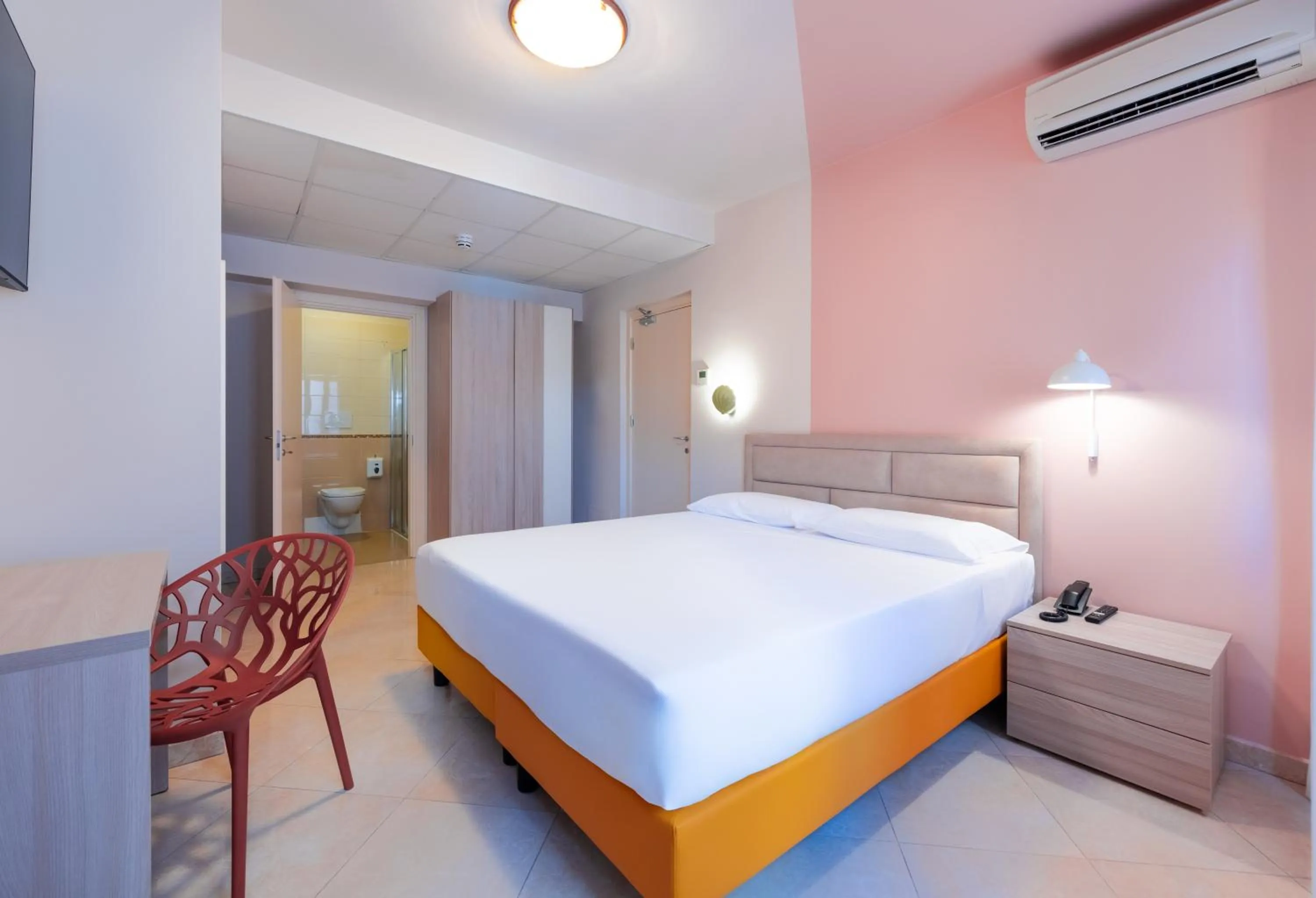 Bed in La Vista Postcard Hotel