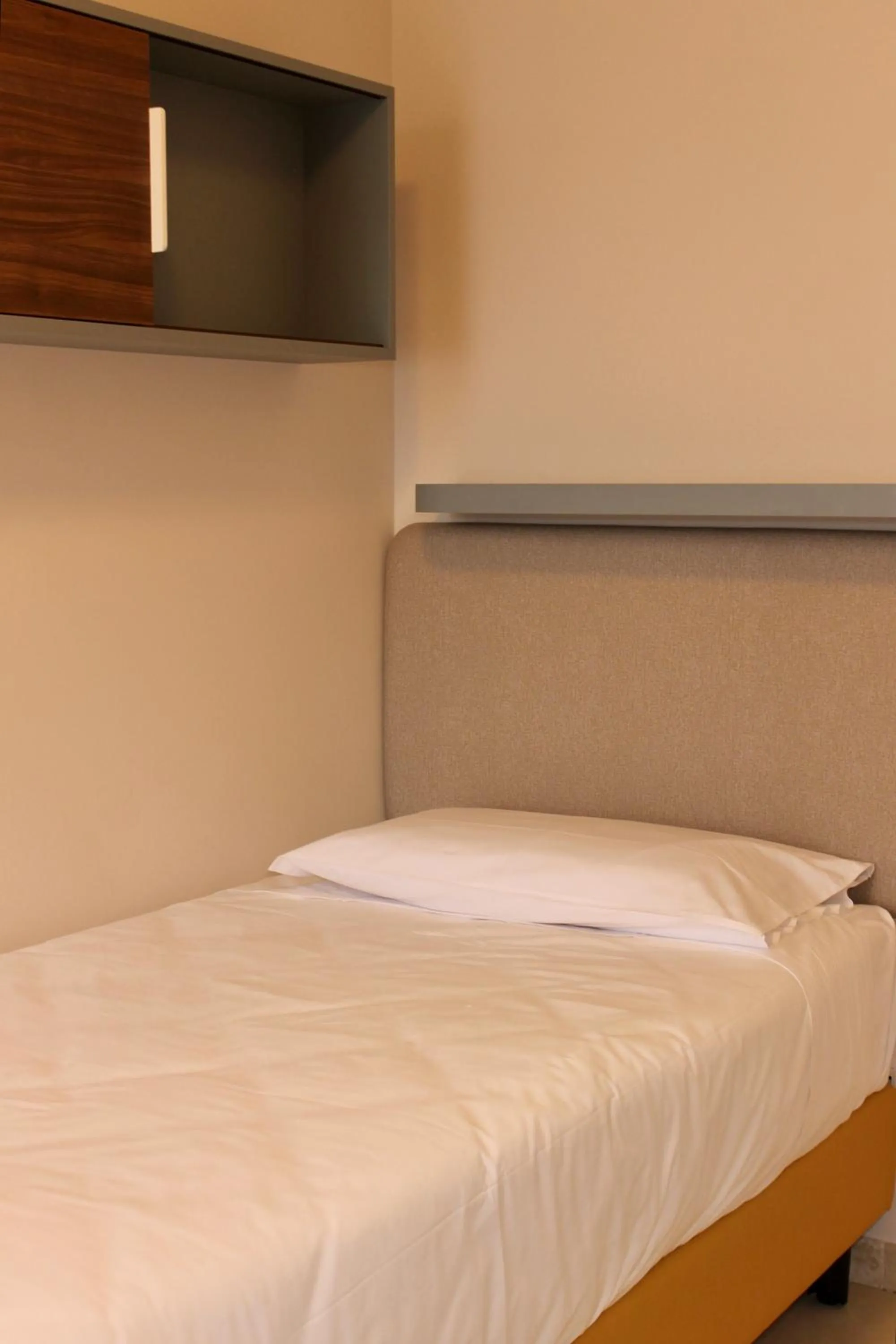 Bed in La Vista Postcard Hotel