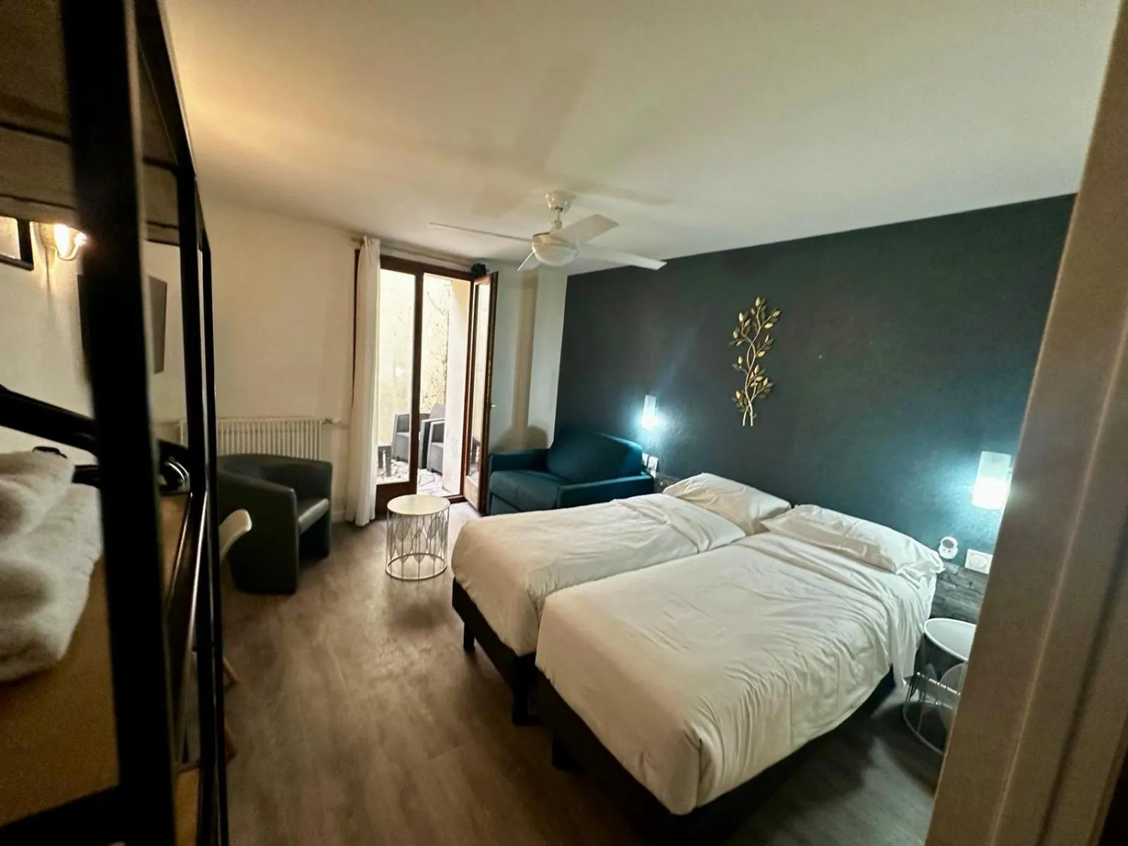 Bed in Hôtel du Maine