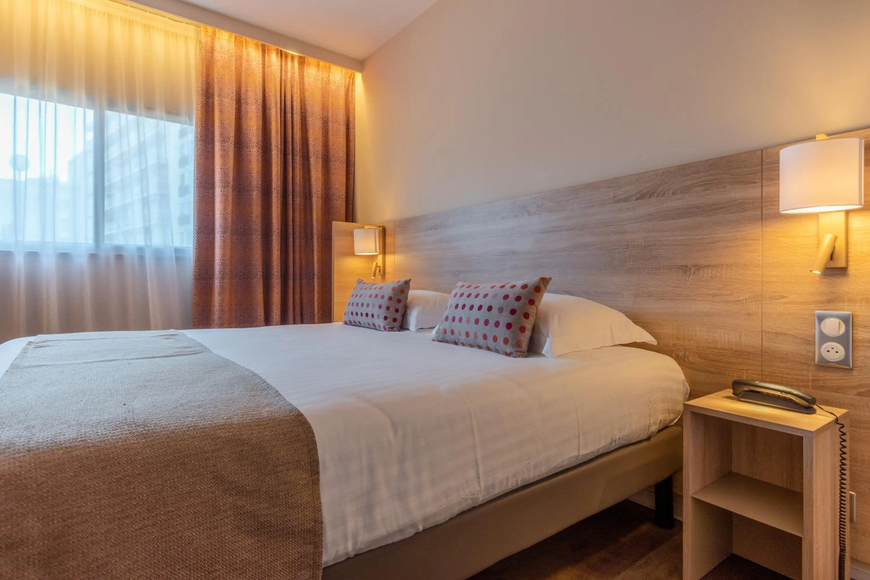 Bed in Hôtel L'Empreinte