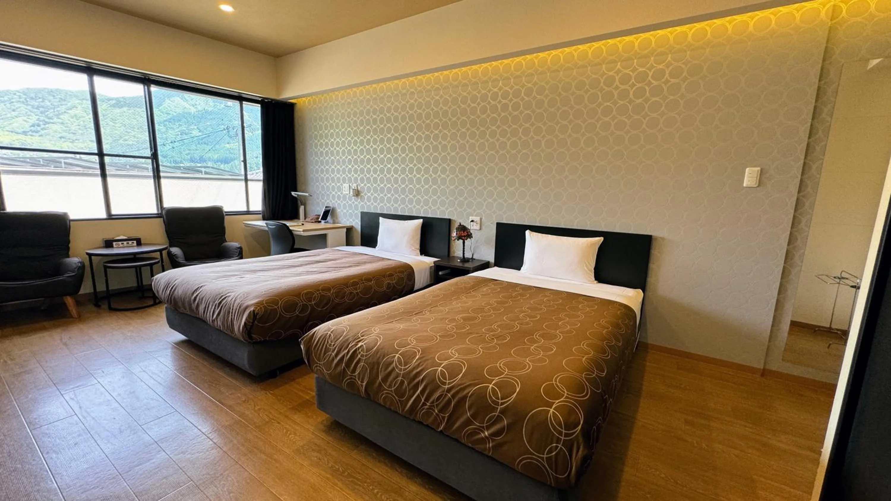 Decorative detail, Bed in Yufuin Akarinoyado