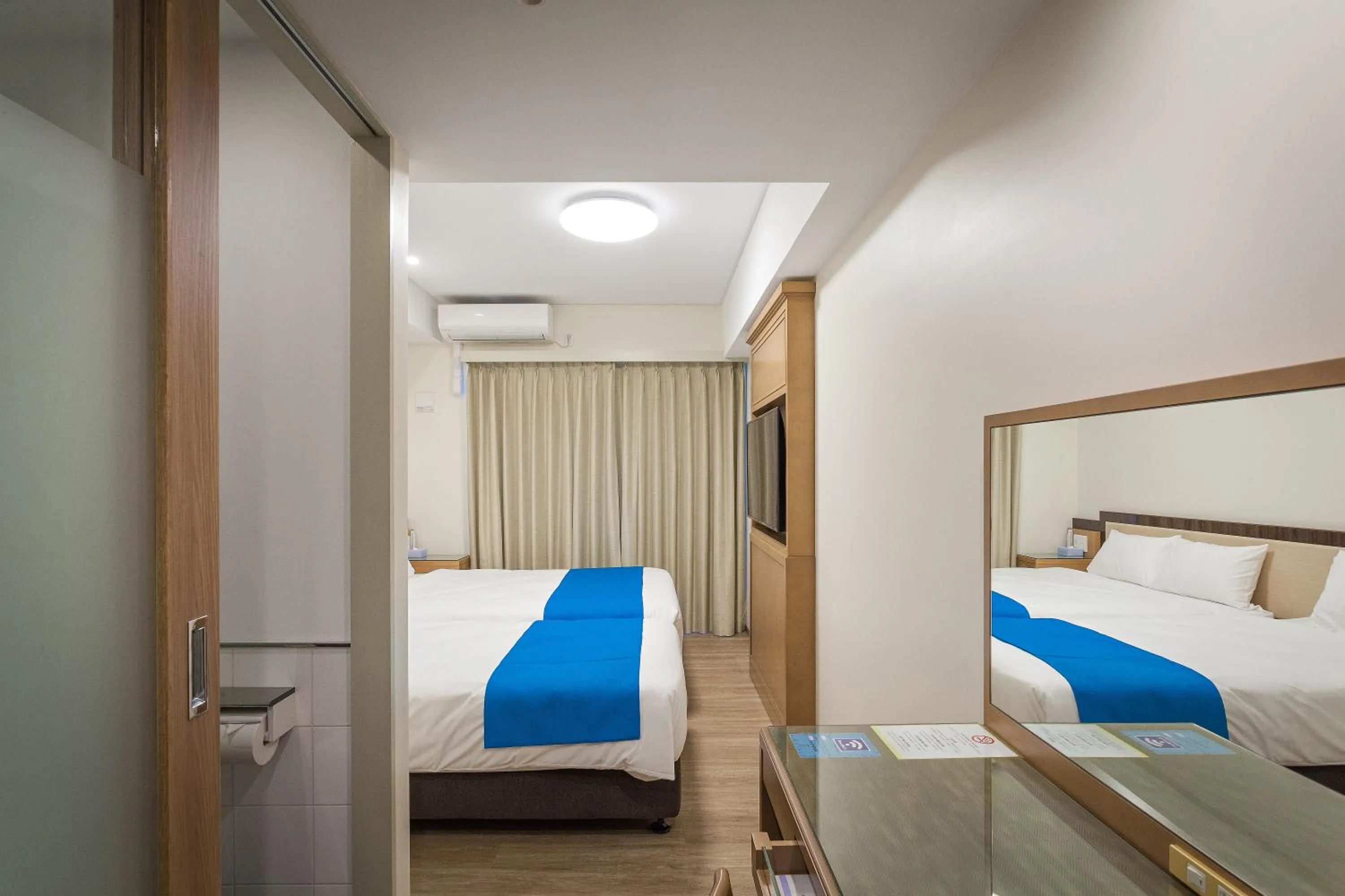 Photo of the whole room, Bed in Kariyushi LCH. Resort