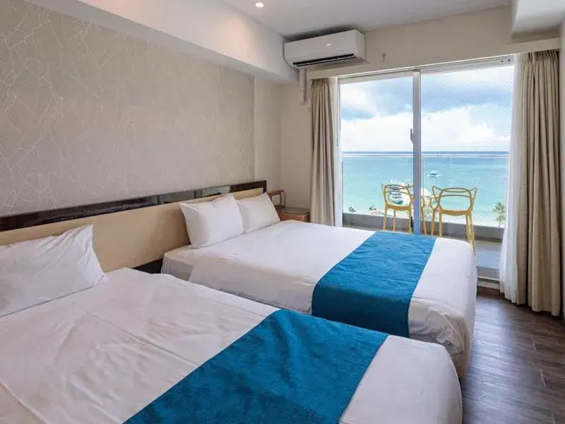 Twin Room with Sea View - single occupancy - Top Floor in Kariyushi LCH. Resort Twin Room with Sea View - single occupancy - Top Floor in Kariyushi LCH. Resort
