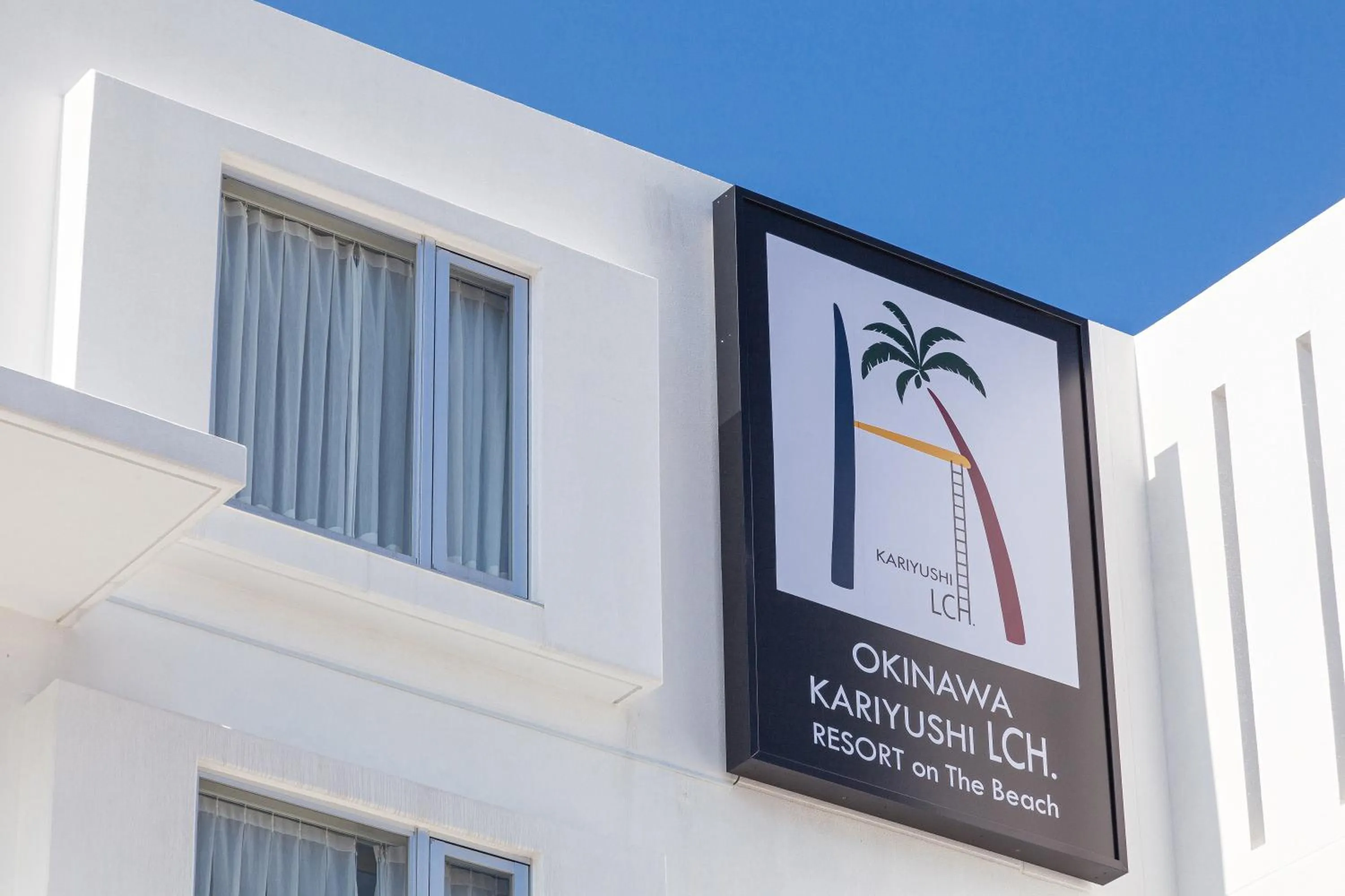 Property logo or sign in Kariyushi LCH. Resort