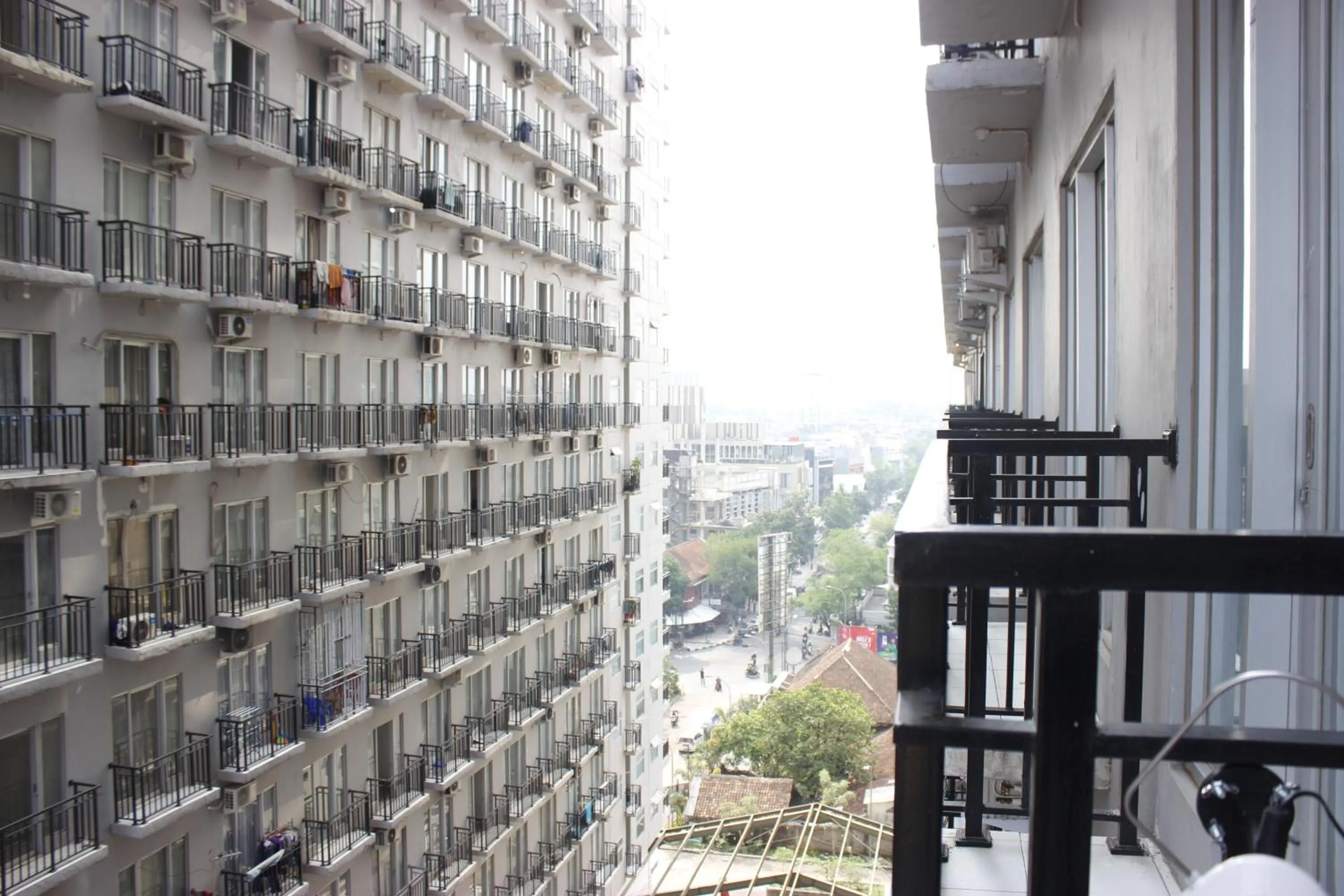 Property building in Monochrome Style Studio Room @Grand Asia Afrika Apartment By Travelio