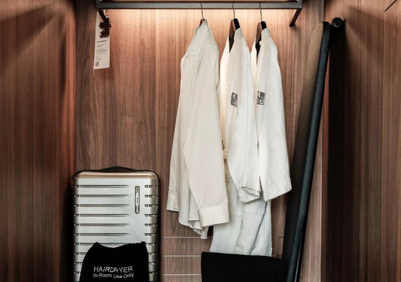 wardrobe in The Clan Hotel Singapore by Far East Hospitality