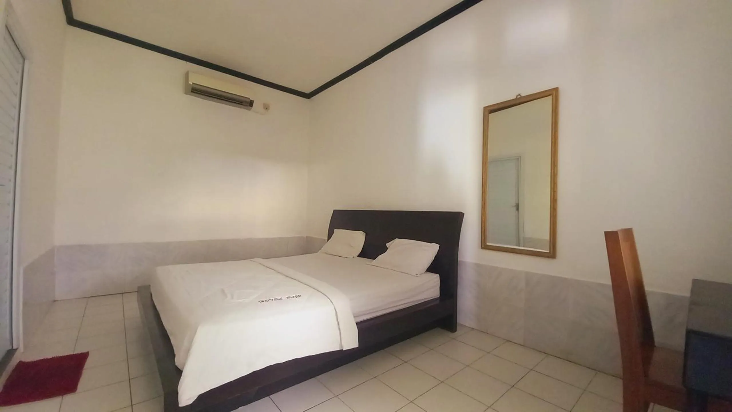 Bed in Bajo Hotel