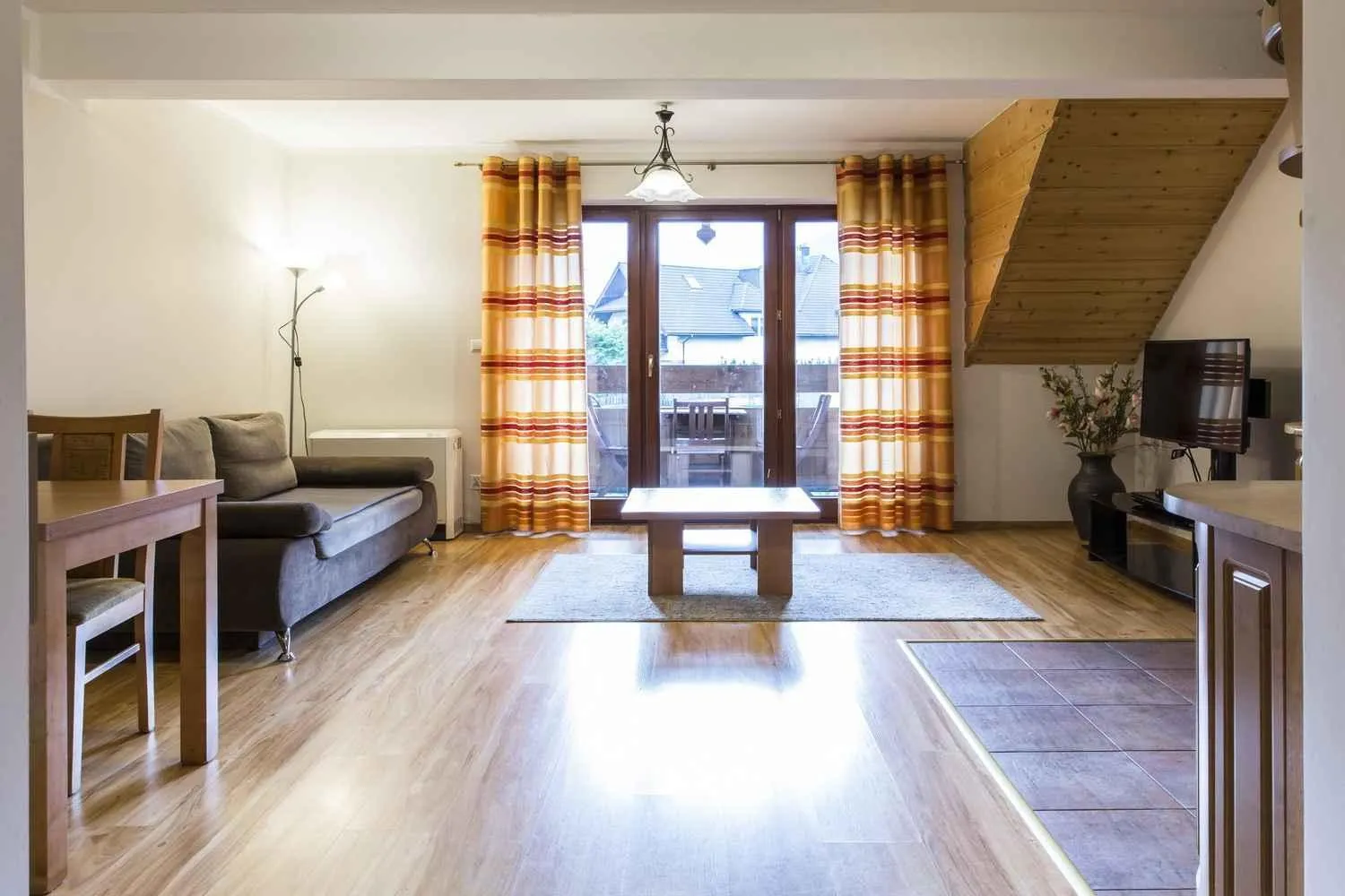 Communal lounge/ TV room in Apartament Giewont