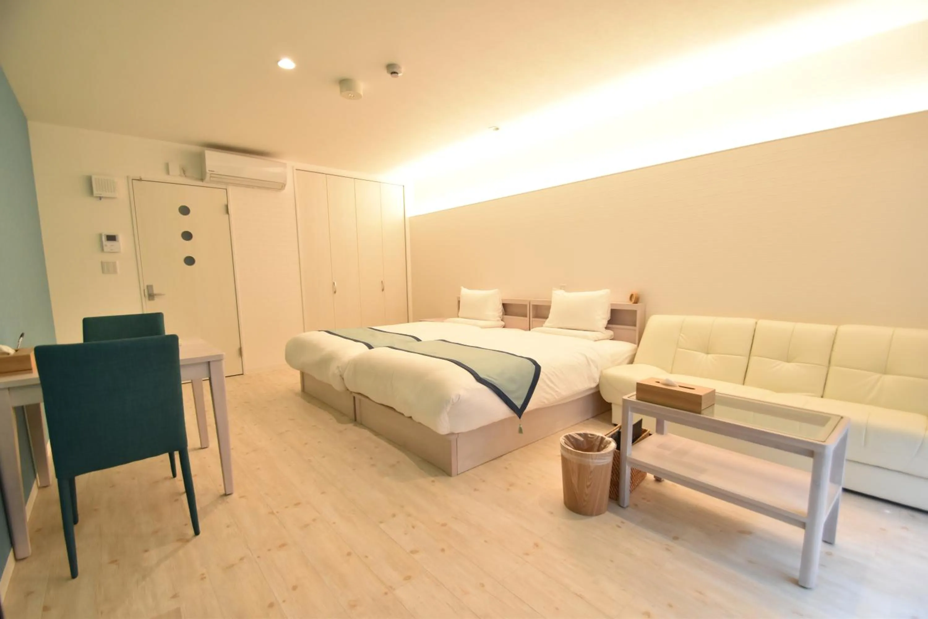 Photo of the whole room, Bed in Pine Hills Hotel Miyakojima