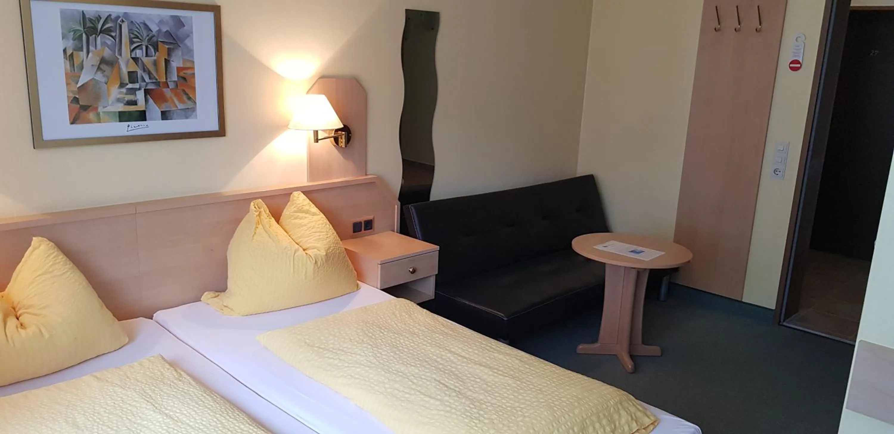 Photo of the whole room, Bed in Panorama Hotel Pension Frohnau