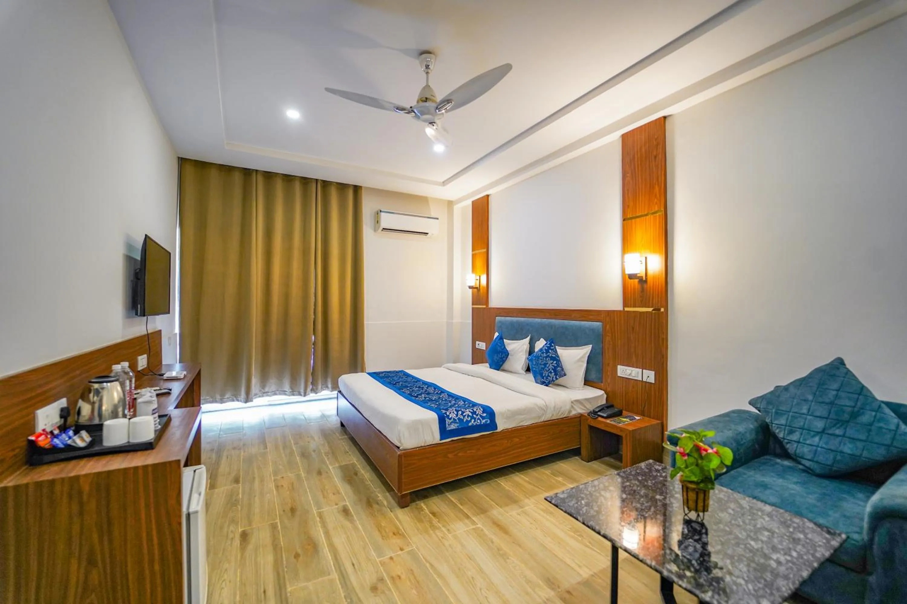 Photo of the whole room, Bed in Vrinda Anandam Resort
