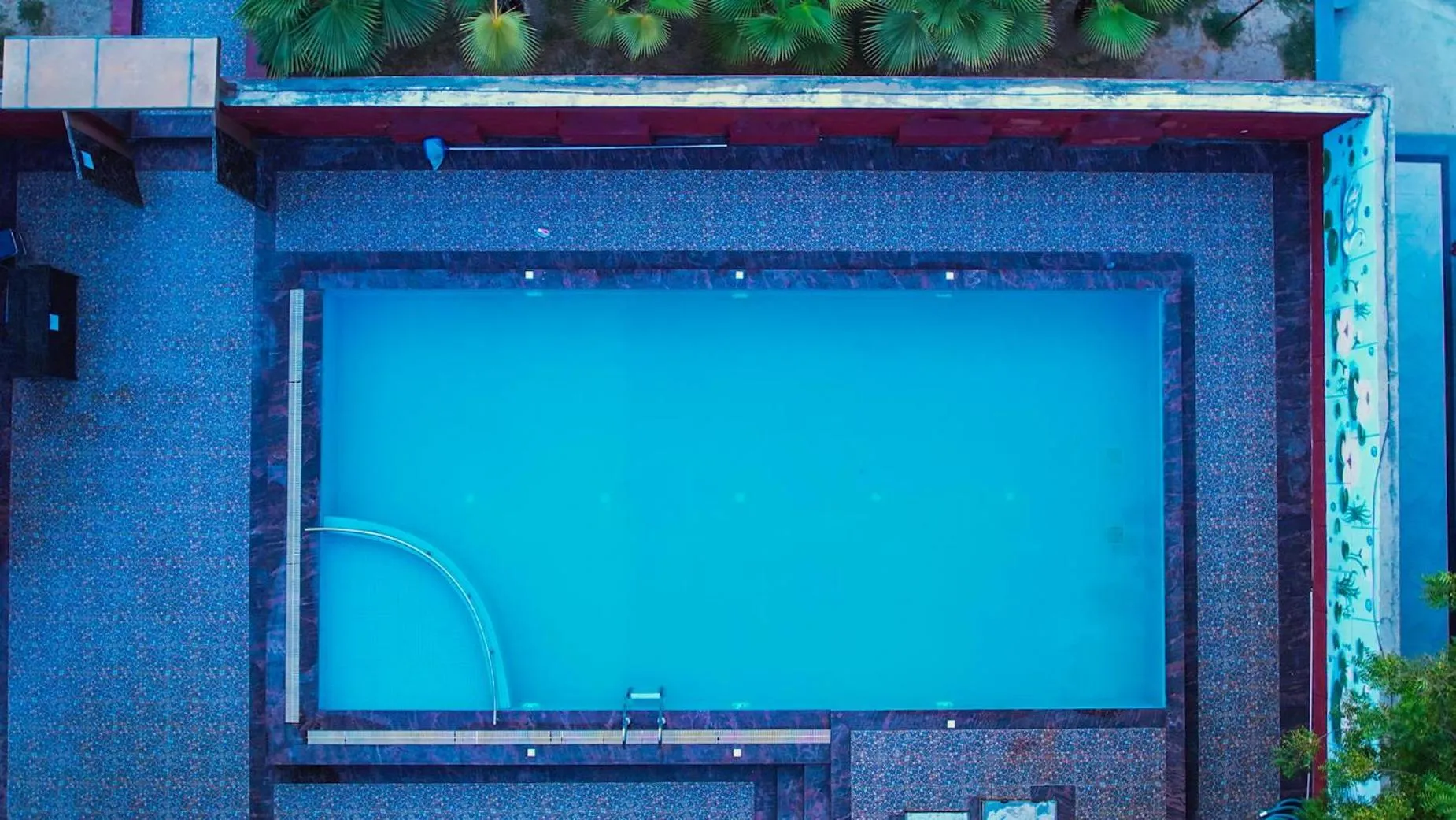 Swimming pool in Vrinda Anandam Resort