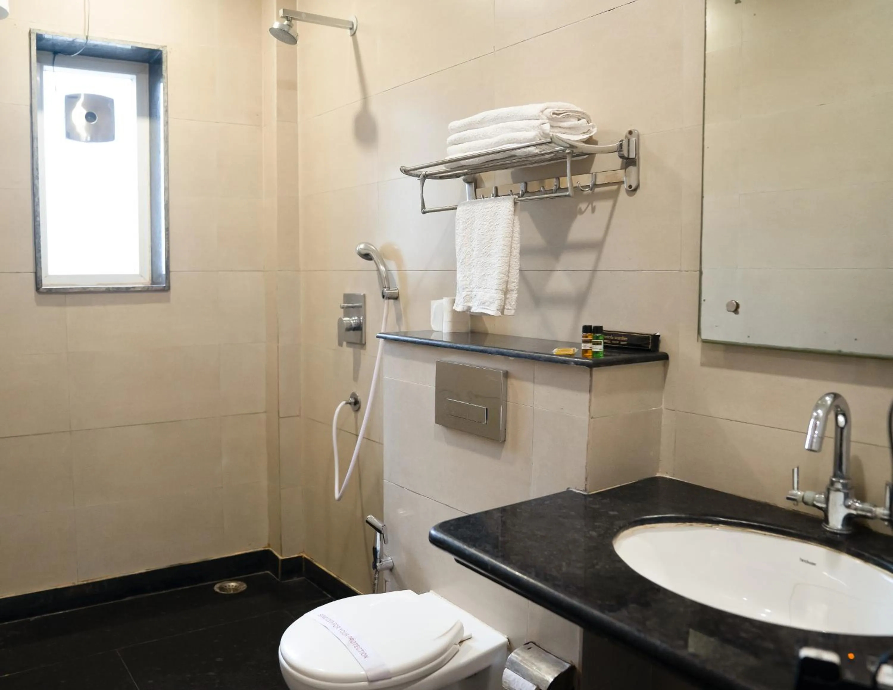 Toilet in Vrinda Anandam Resort