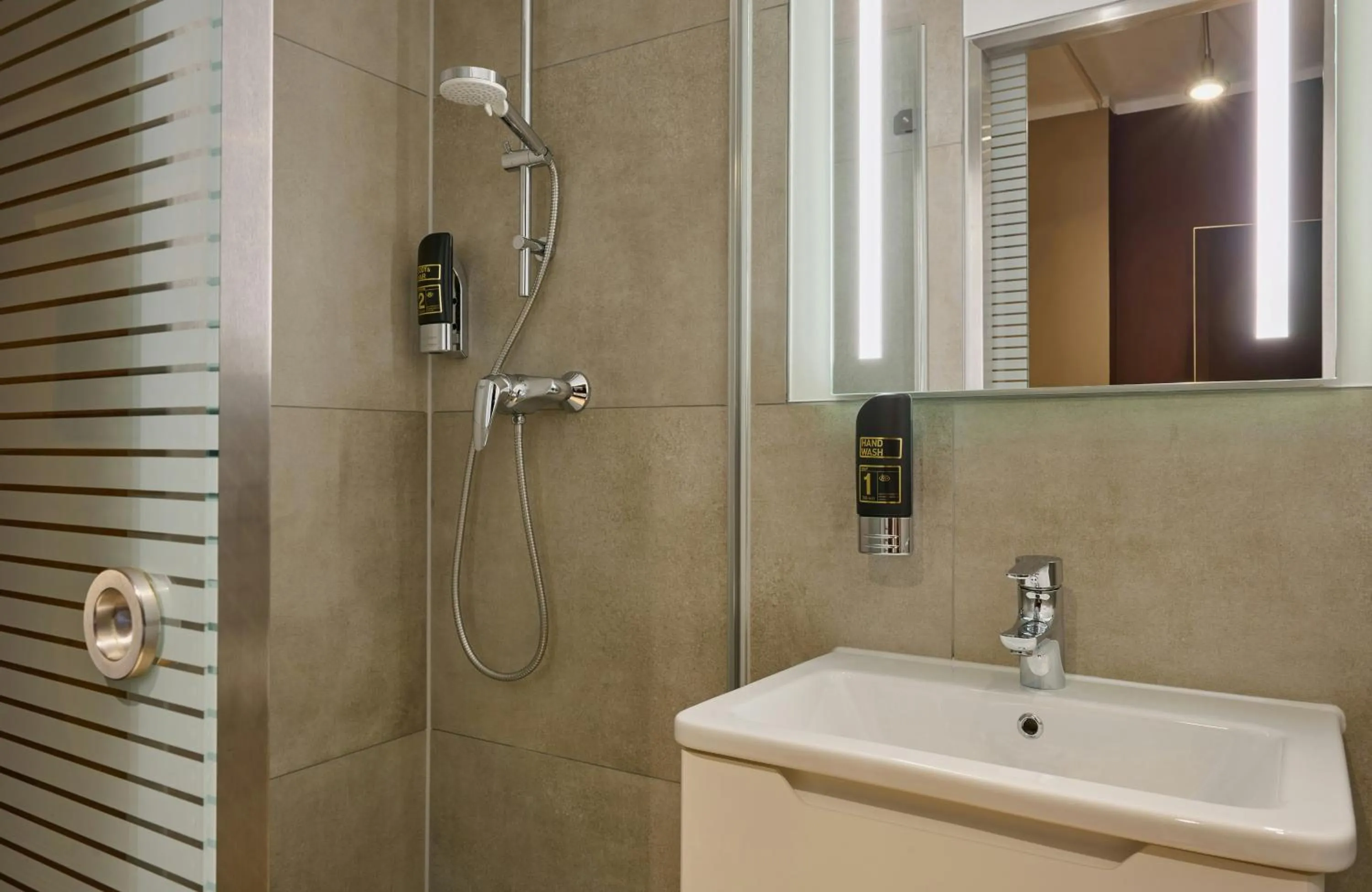 Bathroom in Leonardo Boutique Hotel Munich