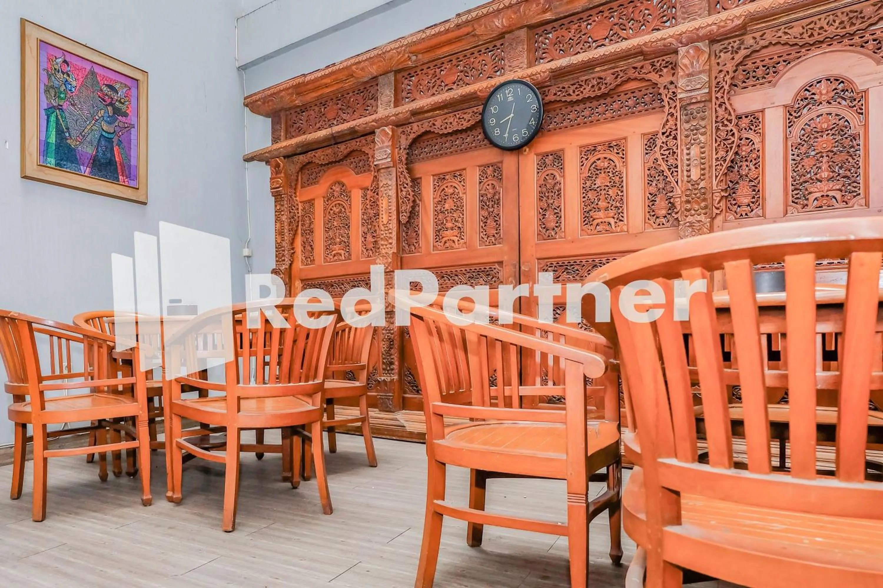 Living room in Hotel Sebelas at Jalan Palasari Mitra RedDoorz