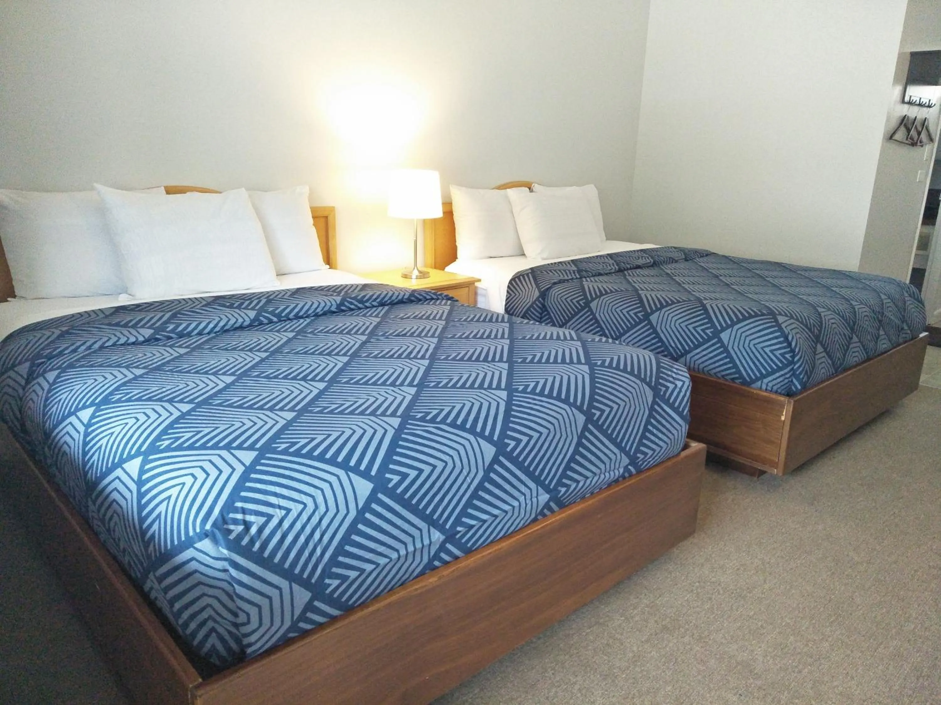 Bed in Sundowner Motel