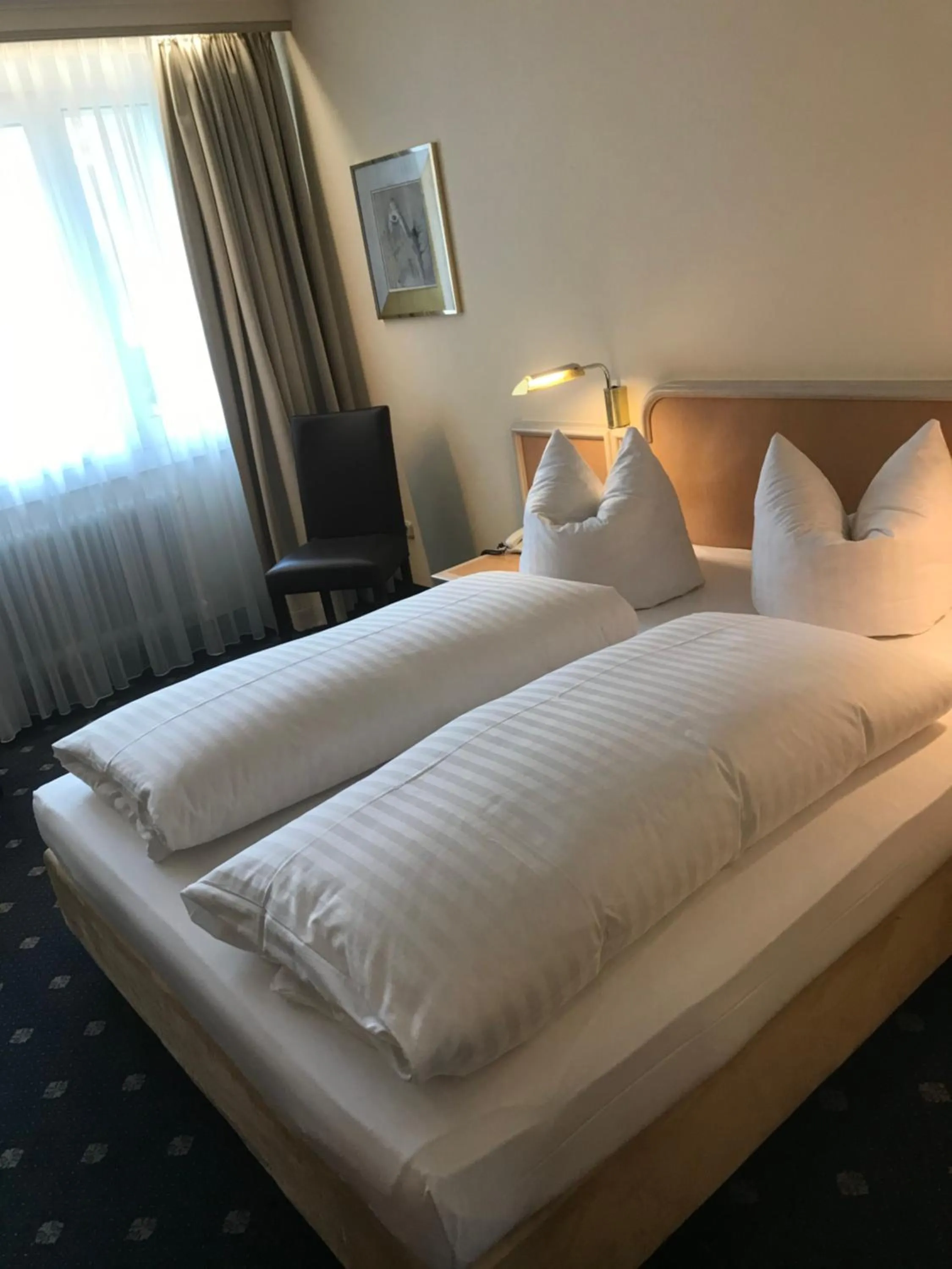 Bed in Hotel Ambiente Garni
