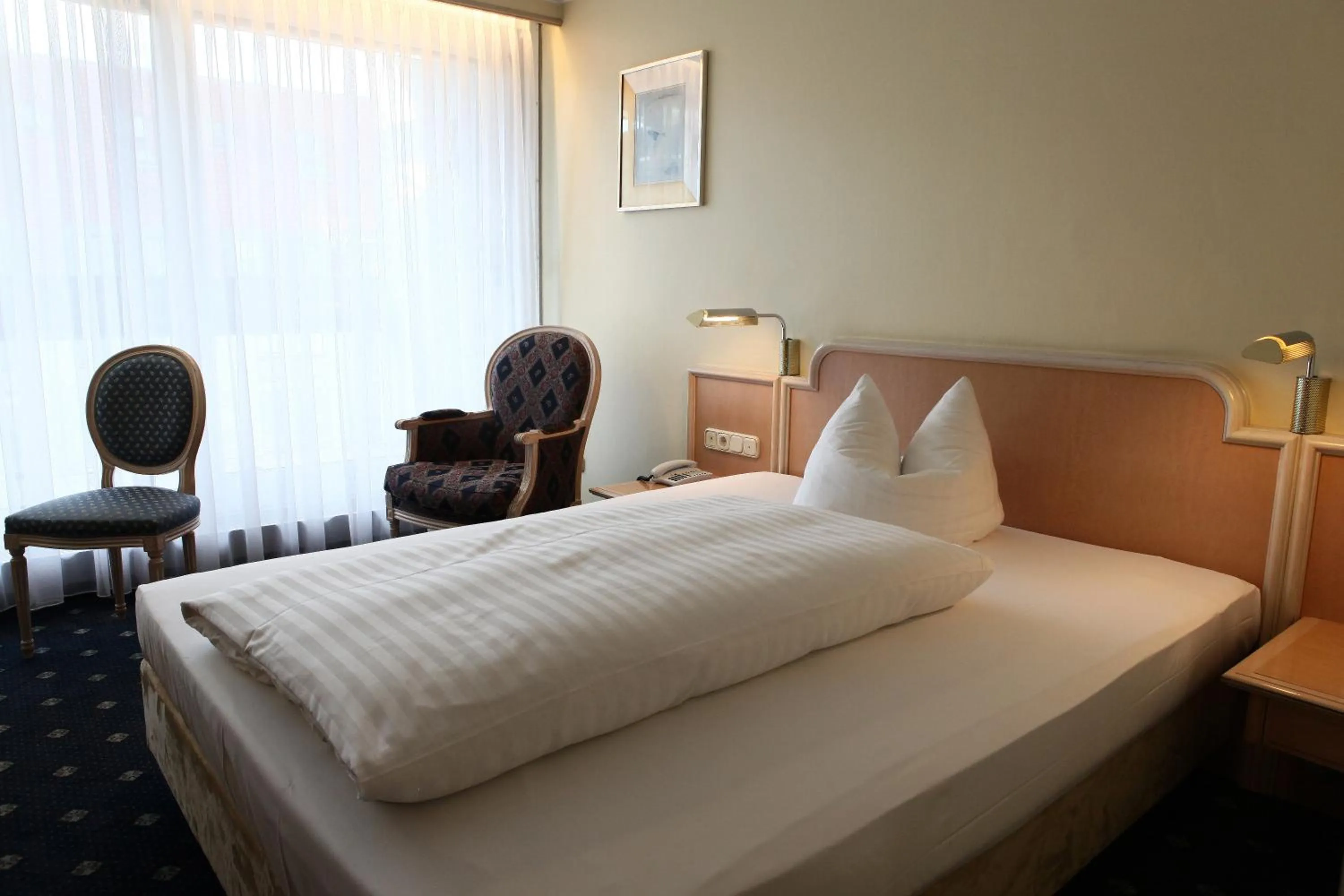 Bed in Hotel Ambiente Garni