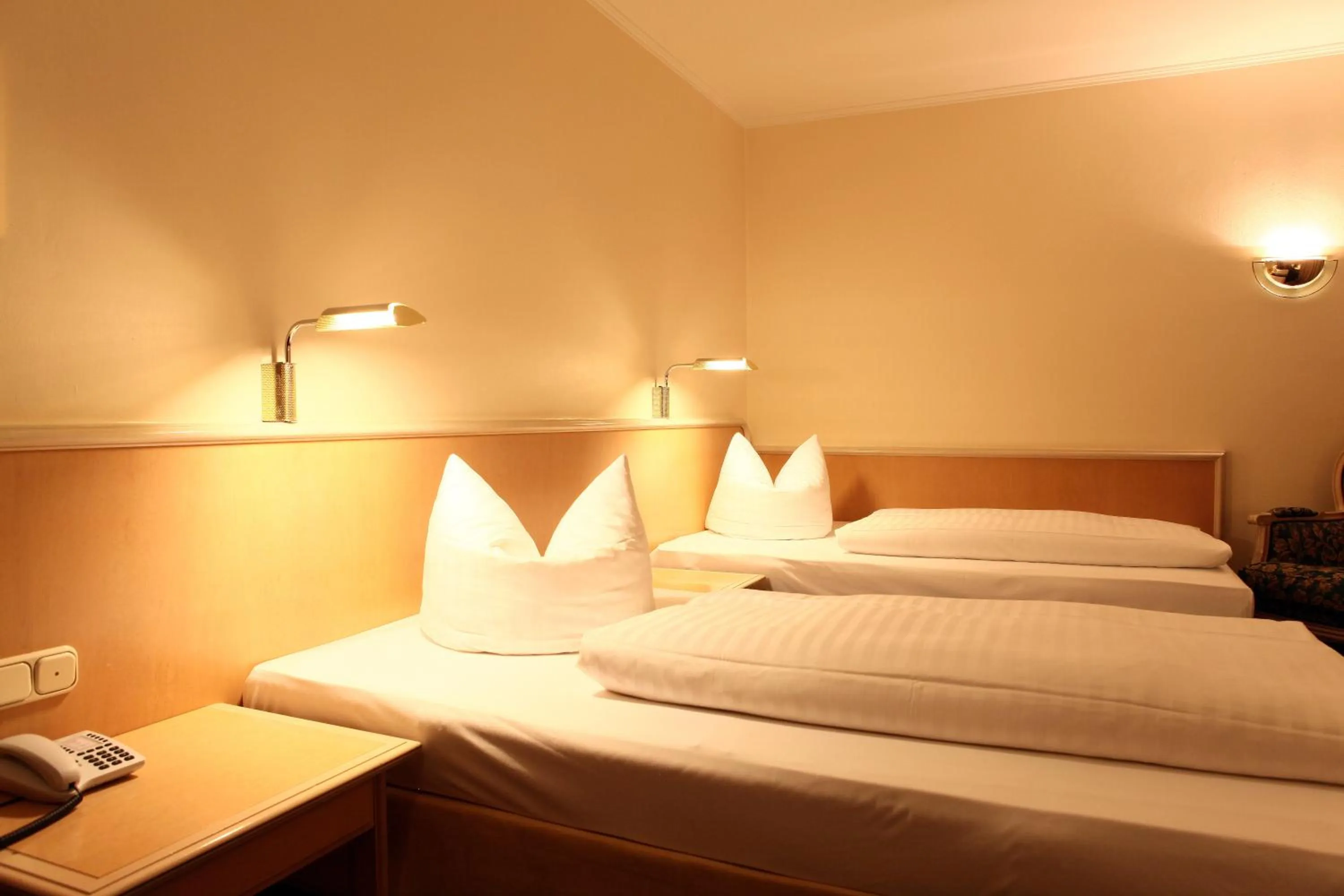 Bed in Hotel Ambiente Garni